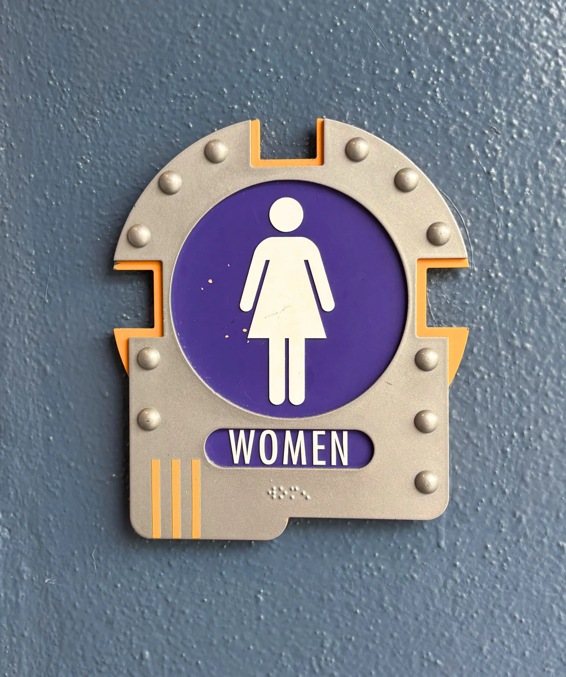 space woman bathroom sign.jpg