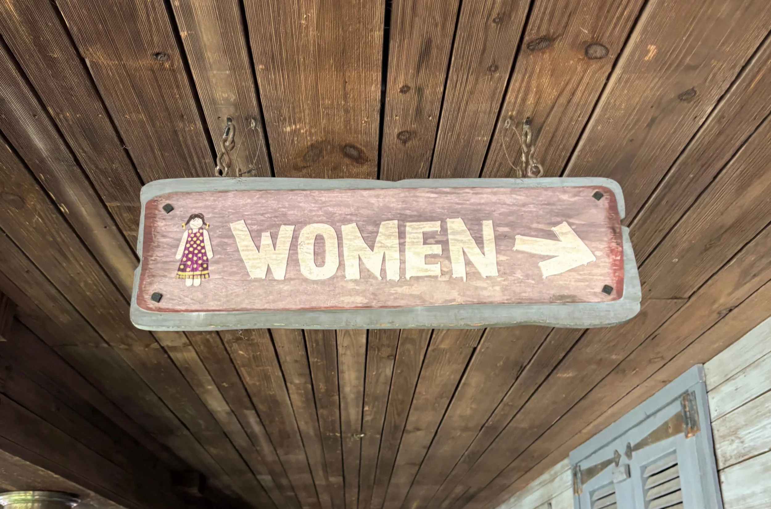 bayou women hanging sign.jpg