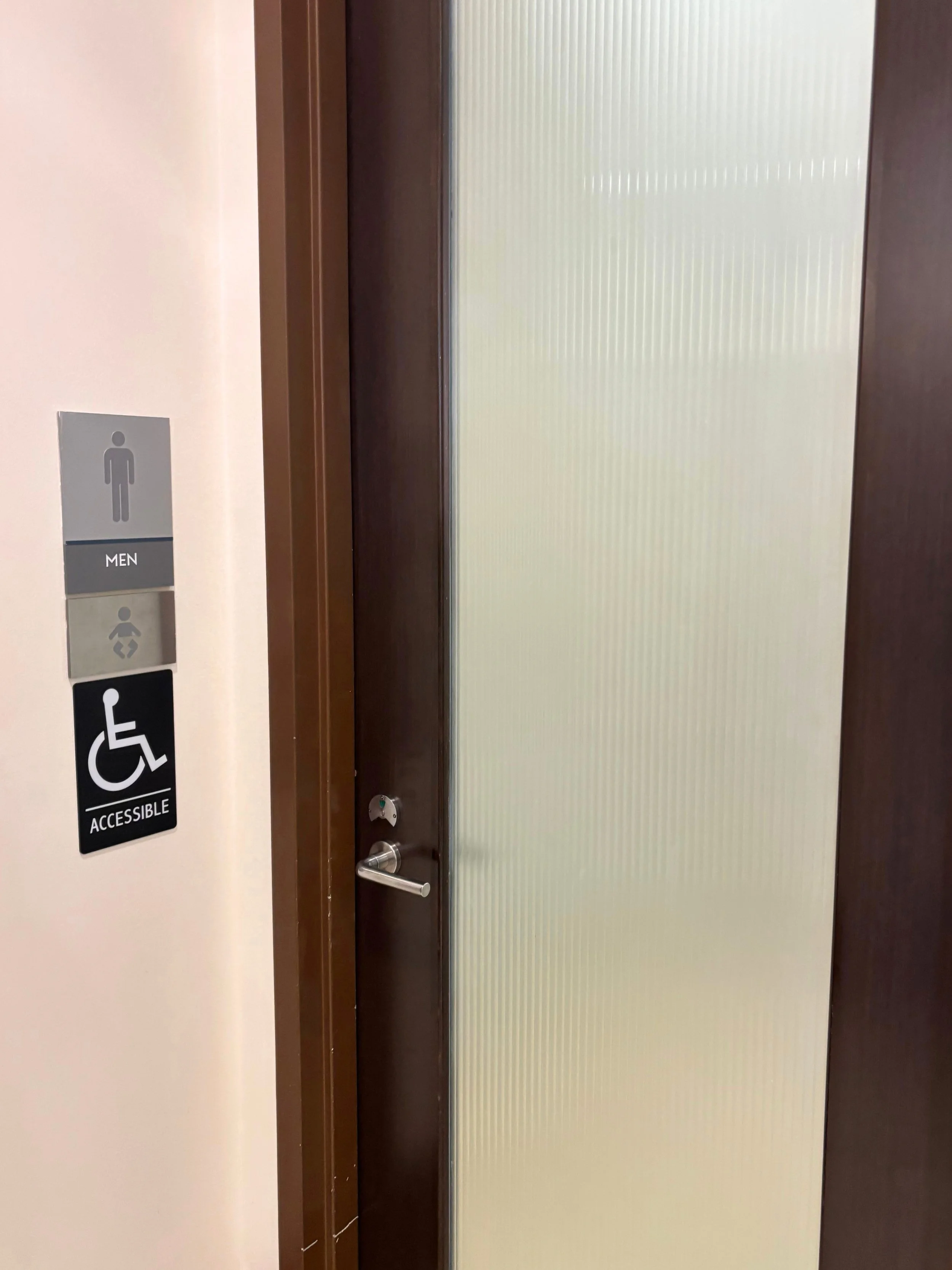 cont dvc men door and sign.jpg