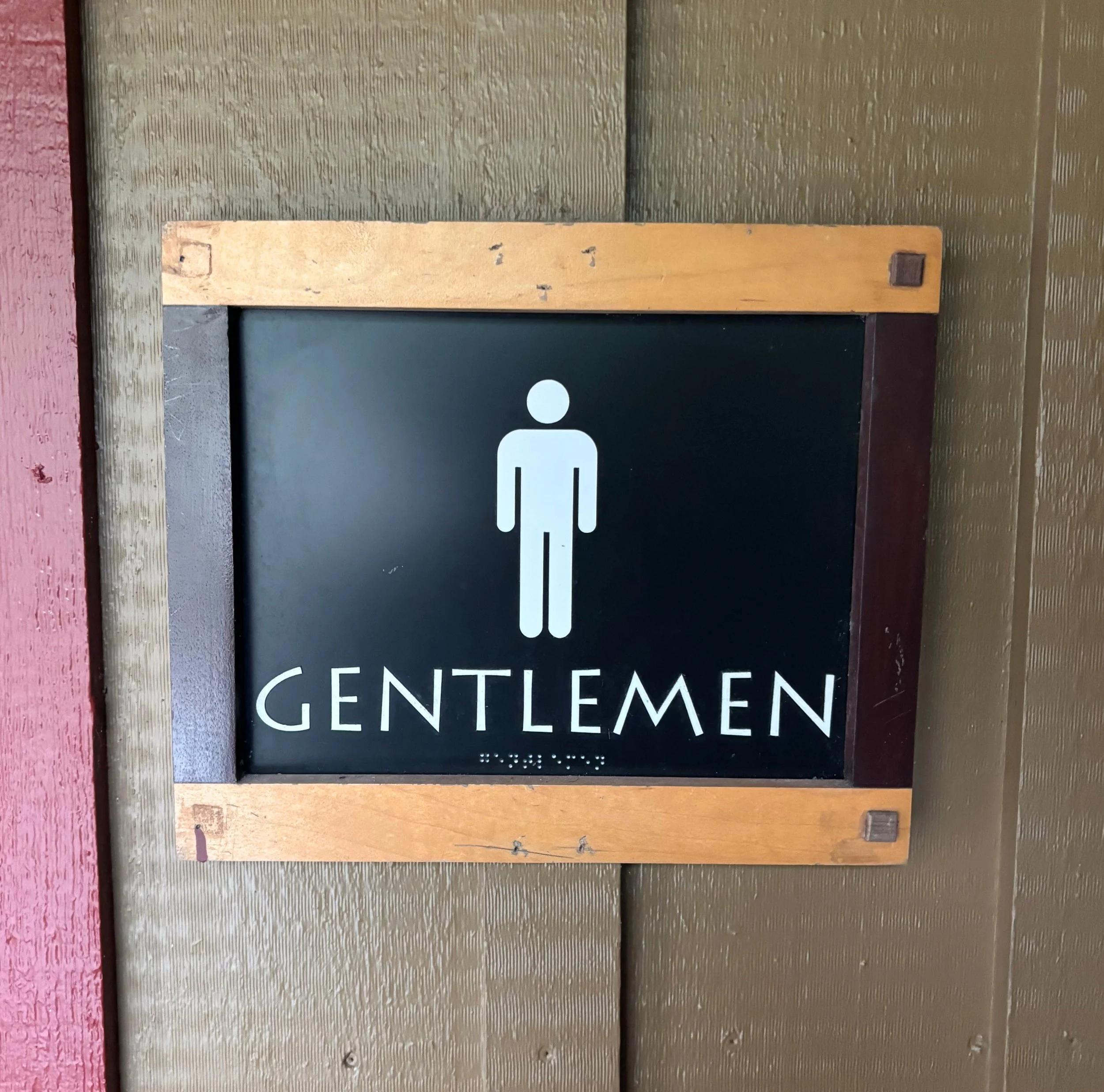 wild under men sign.jpg