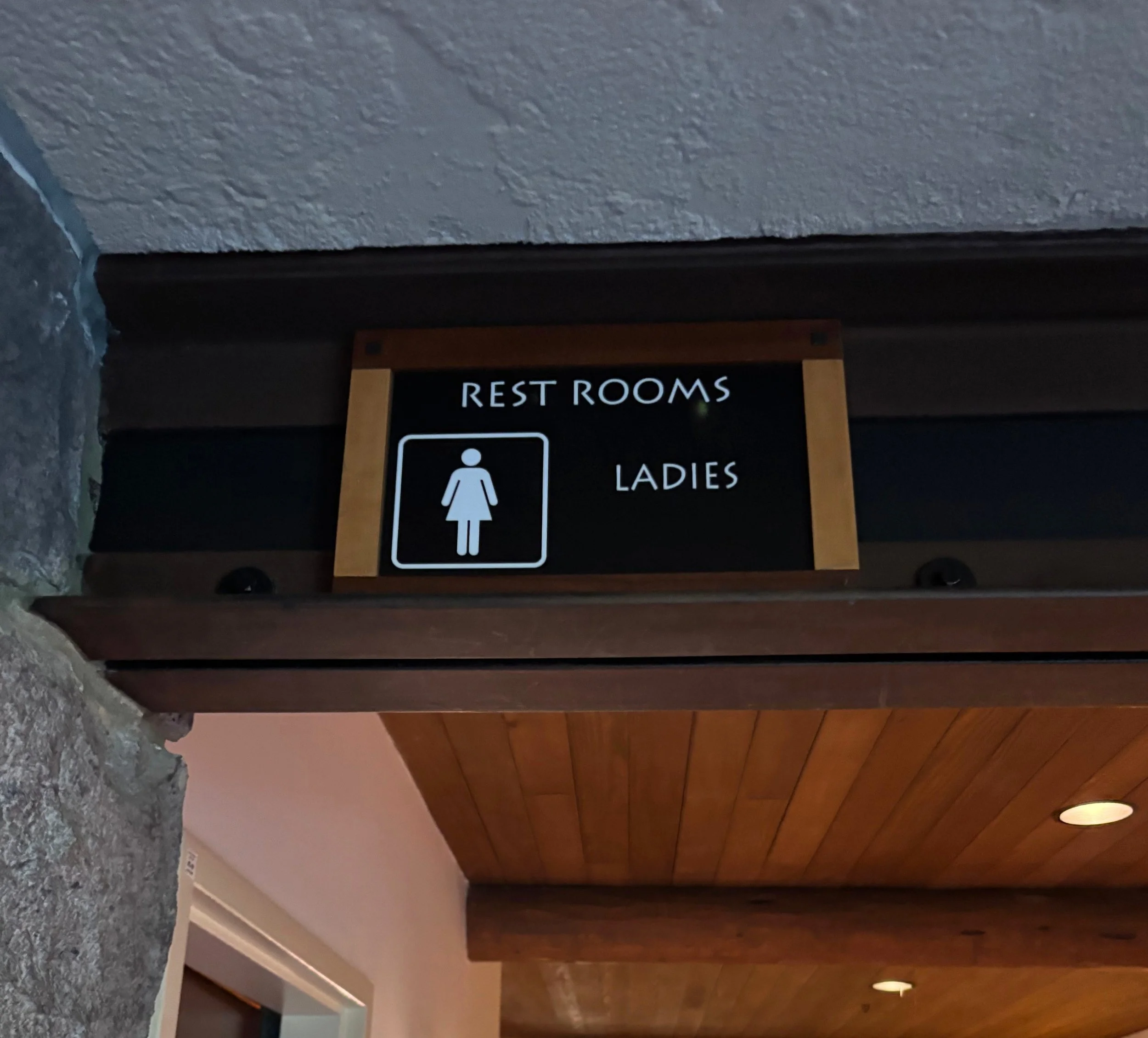 wild roar outside women sign.jpg
