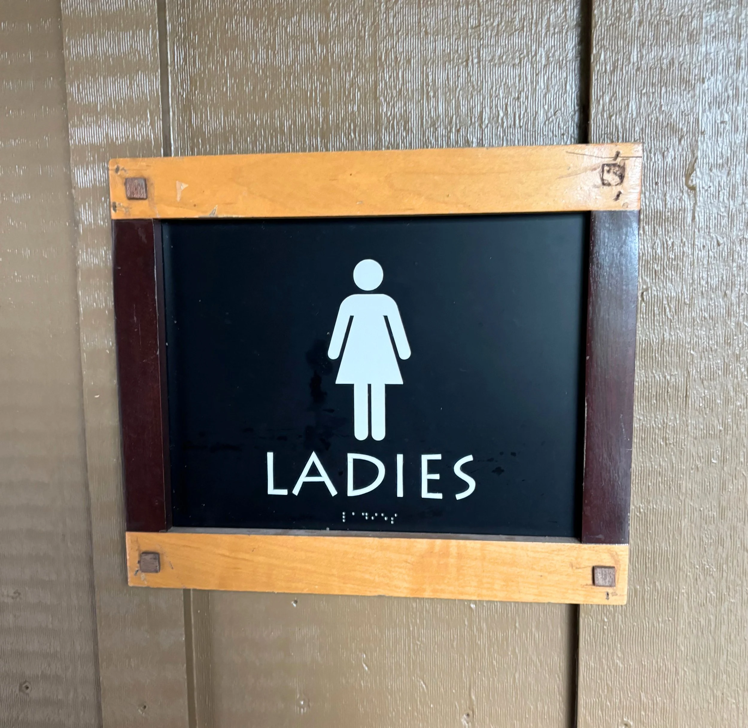wild under women sign.jpg