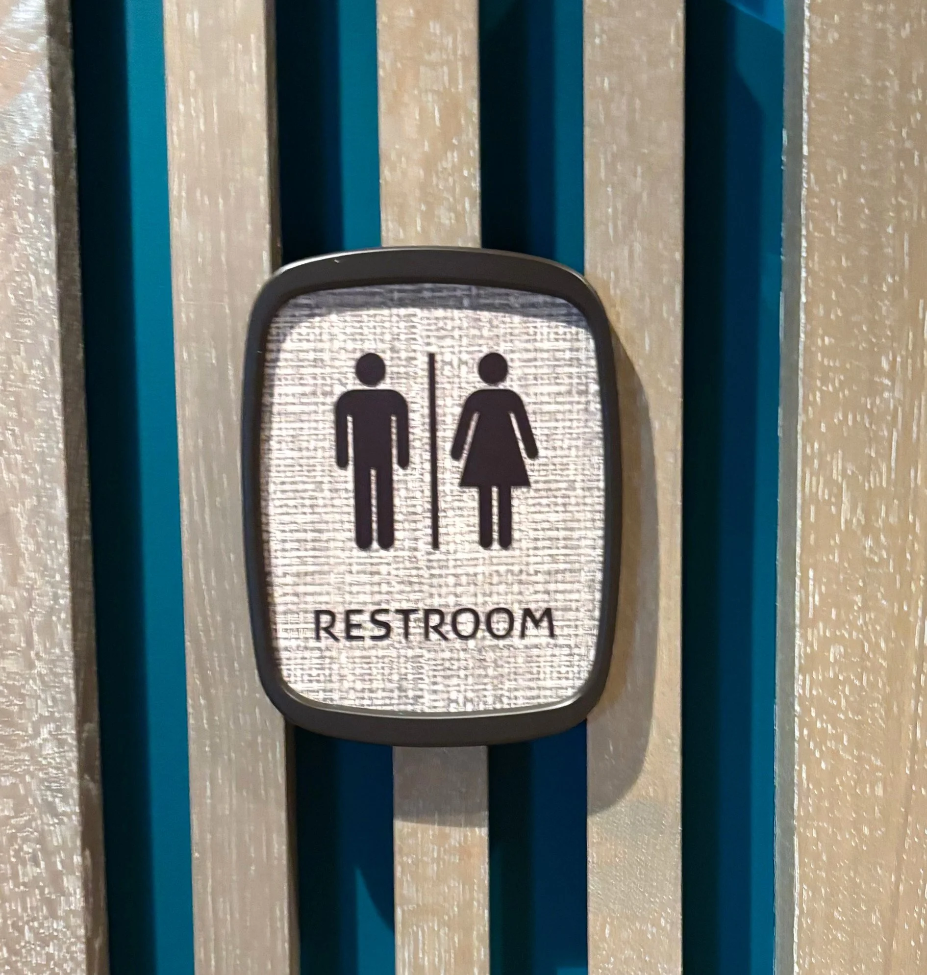 poly w comp bathroom sign.jpg