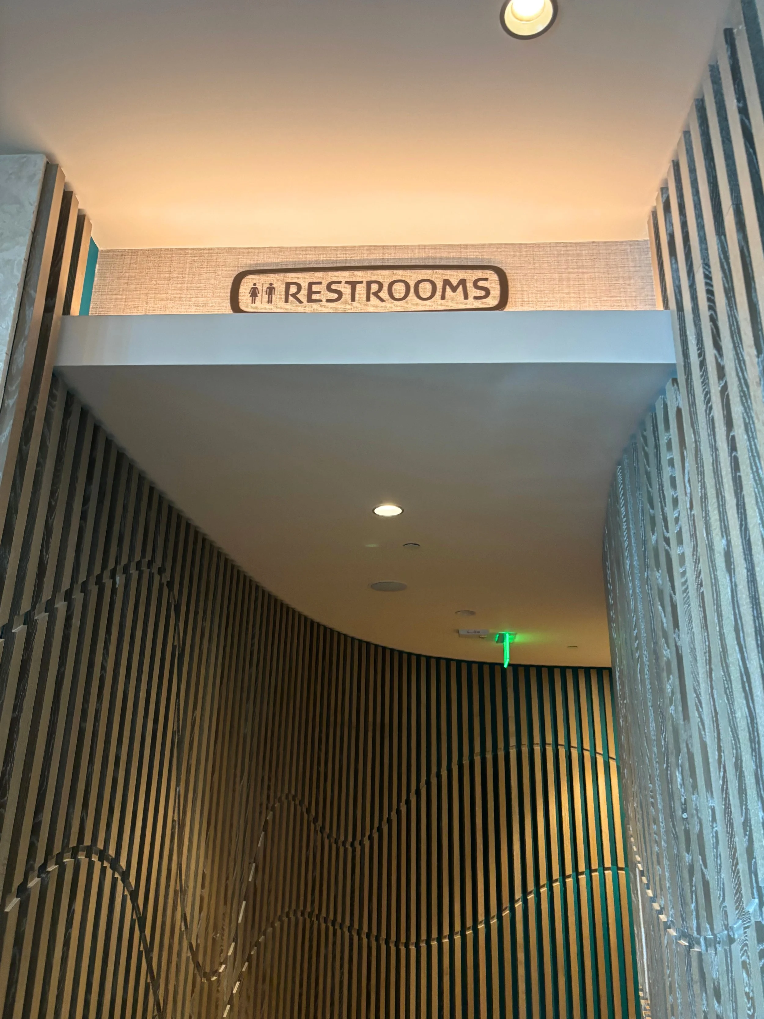 poly w wide restroom sign.jpg