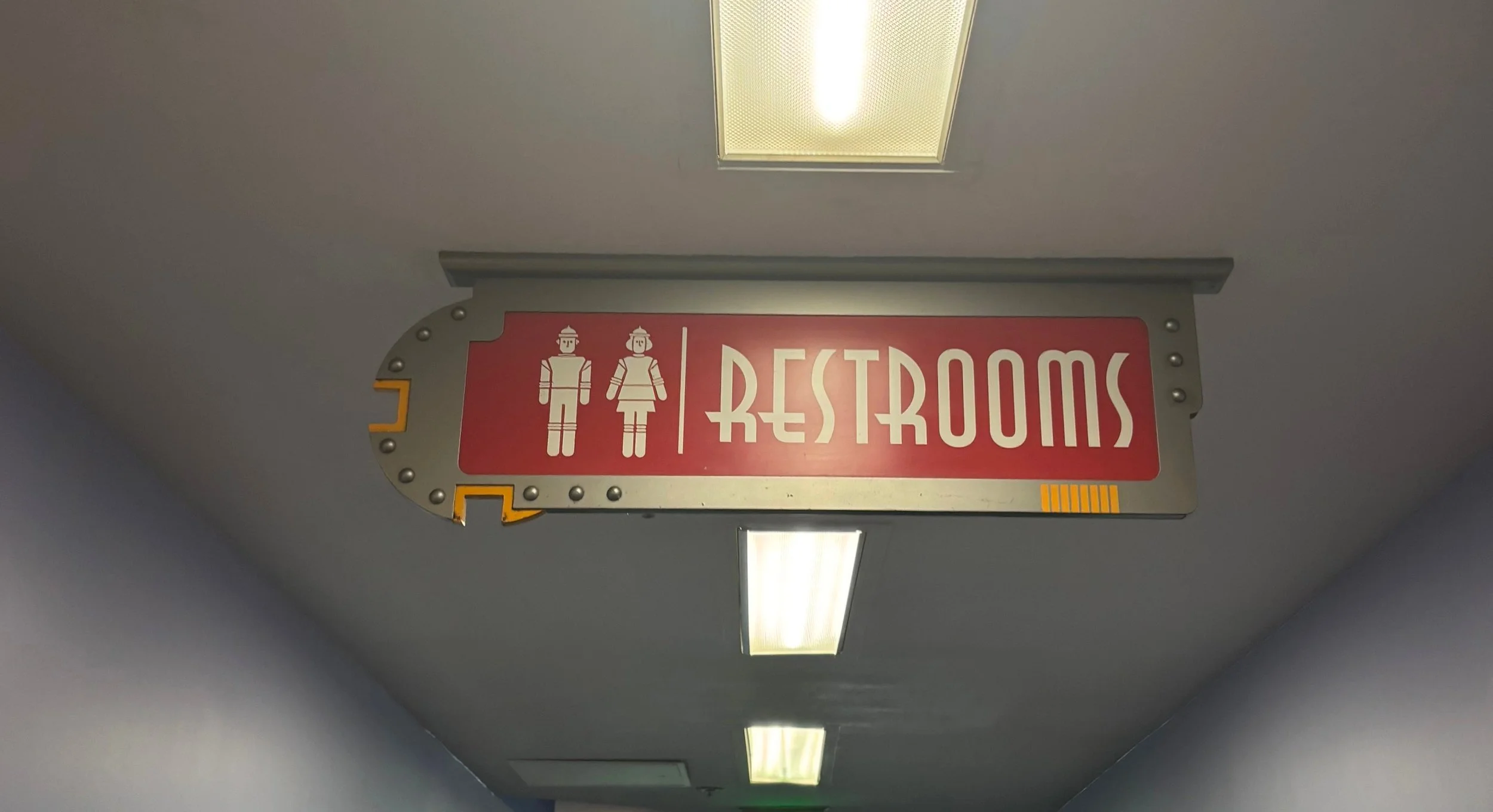 cosmic red restroom sign.jpg