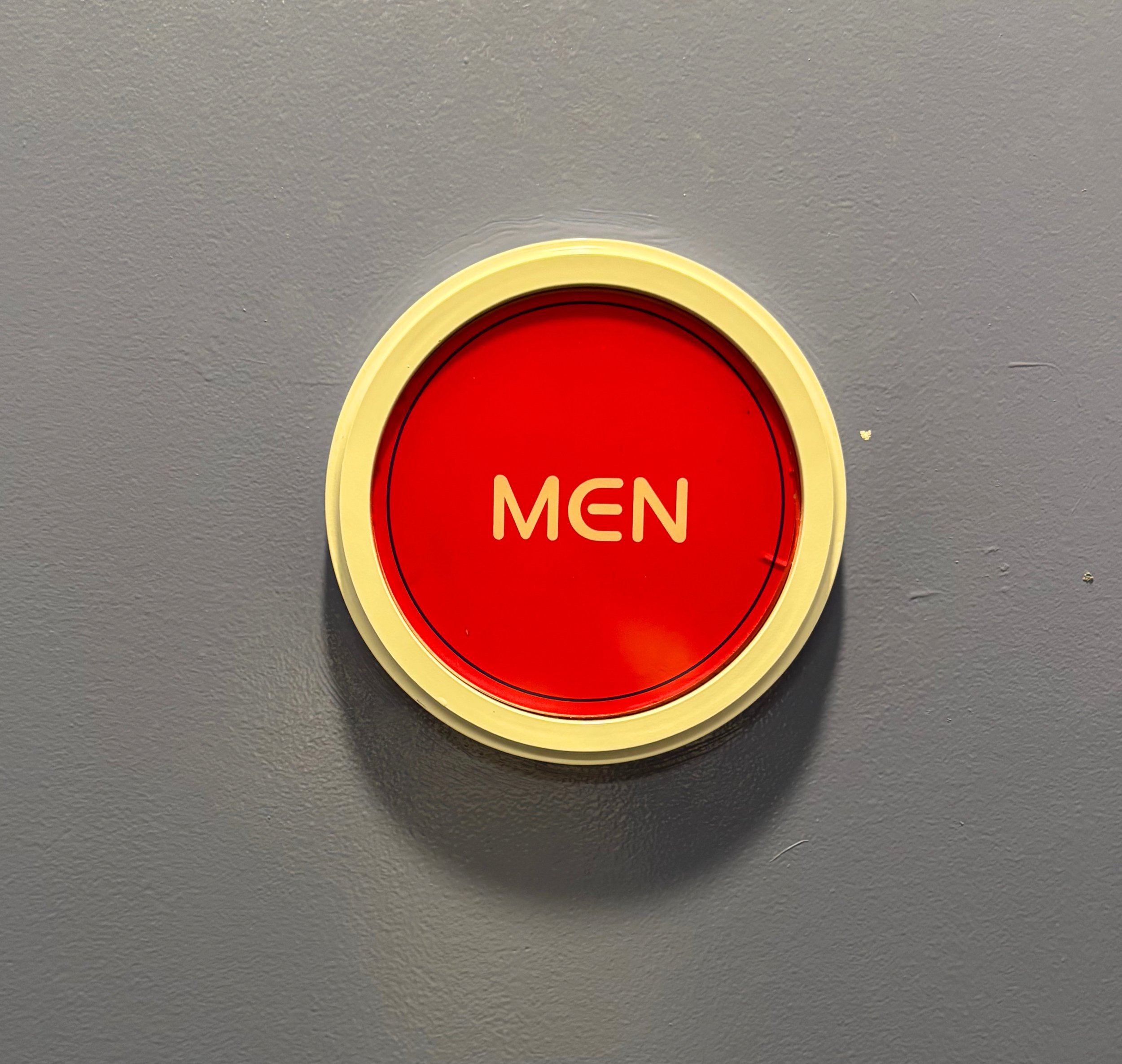 cosmic red men sign.jpg