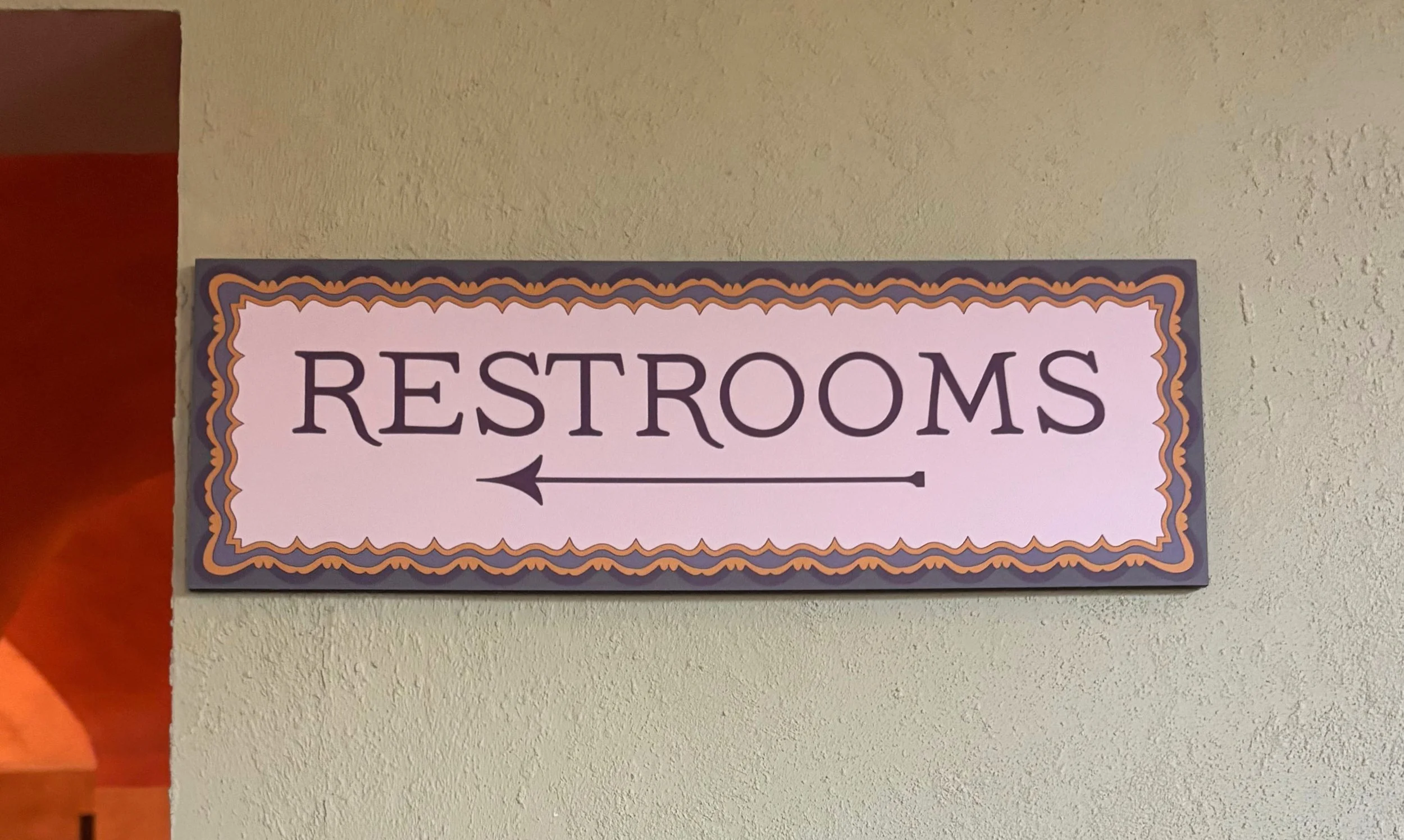 via pink restroom sign.jpg