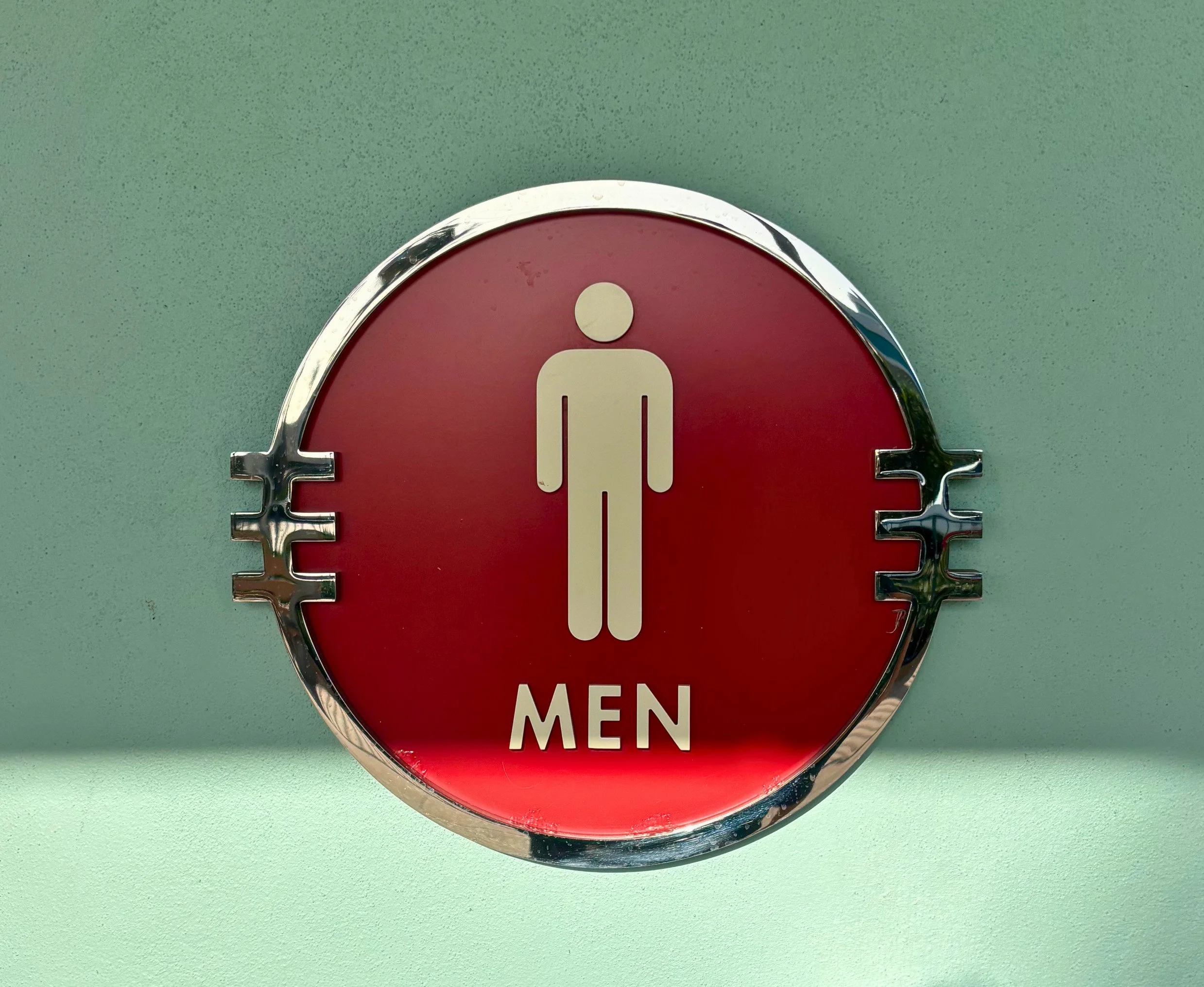 hs right outside bathroom men sign.jpg