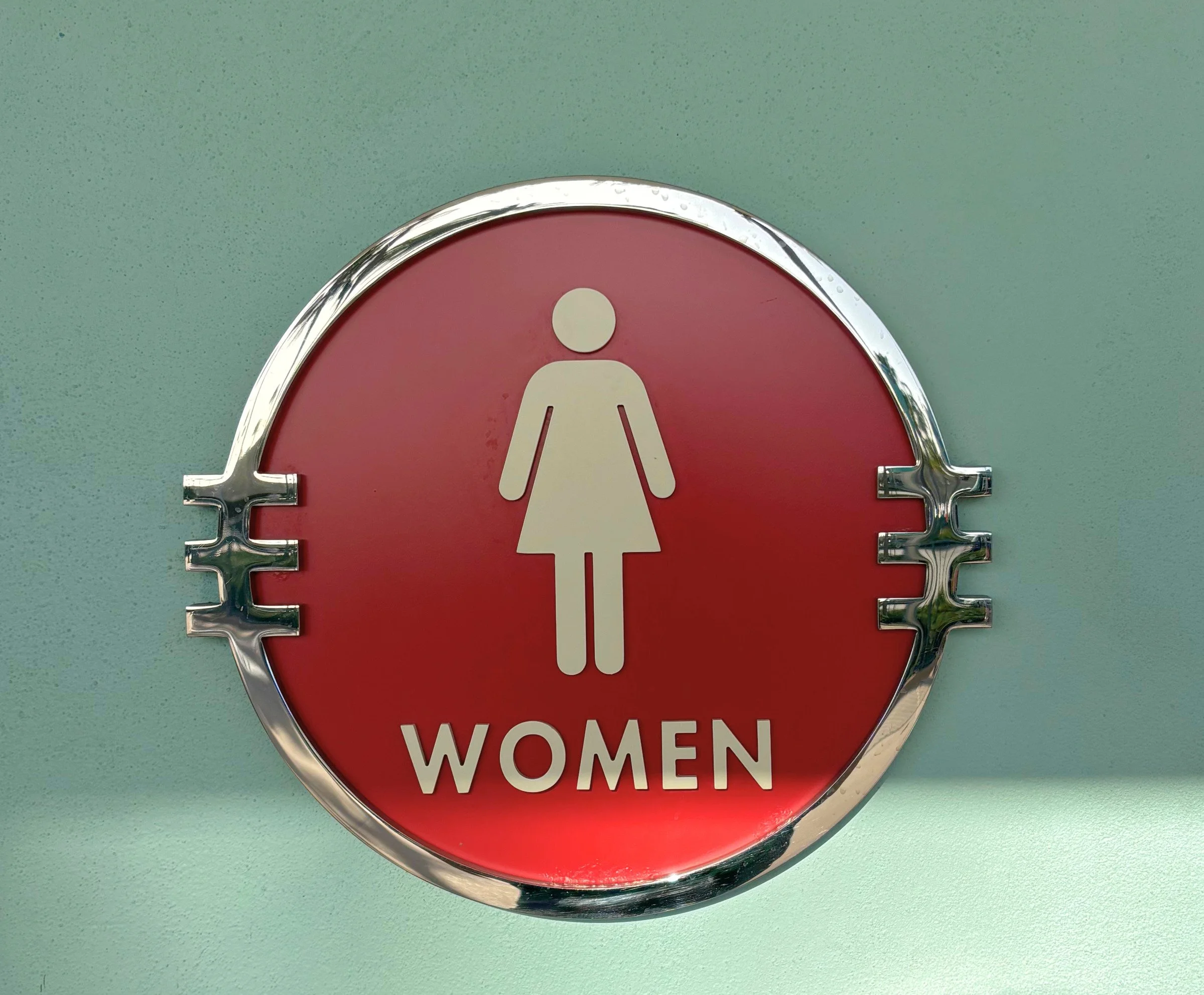 hs right outside bathroom women sign.jpg