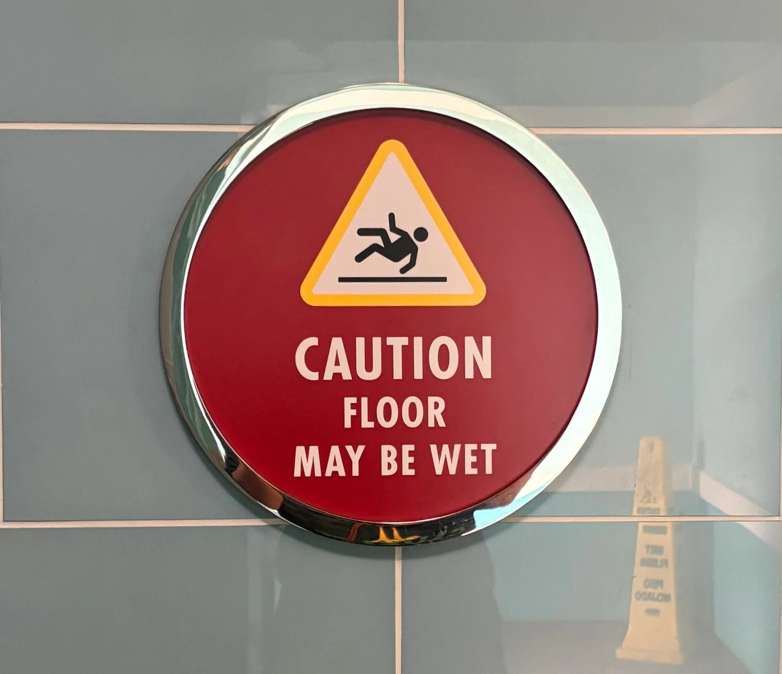 hs right outside bathroom caution sign.jpg