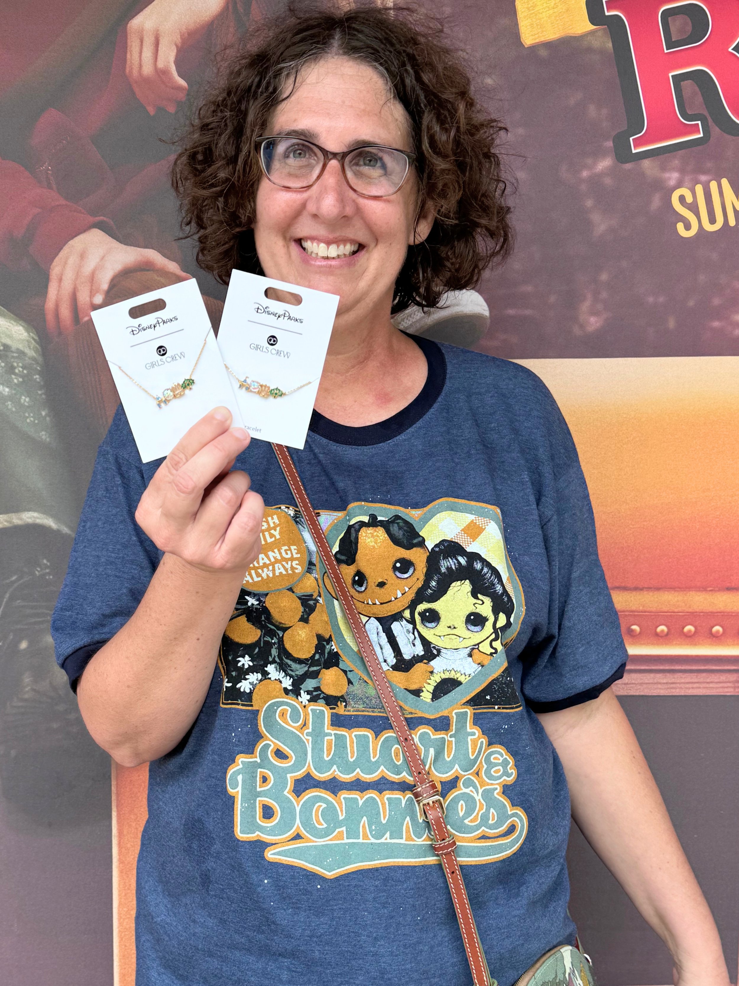 Maggie at Disney Springs buying a Girls Crew bracelet and necklace.