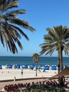 At Clearwater Beach, a beautiful white beach with blue water and blue skies.