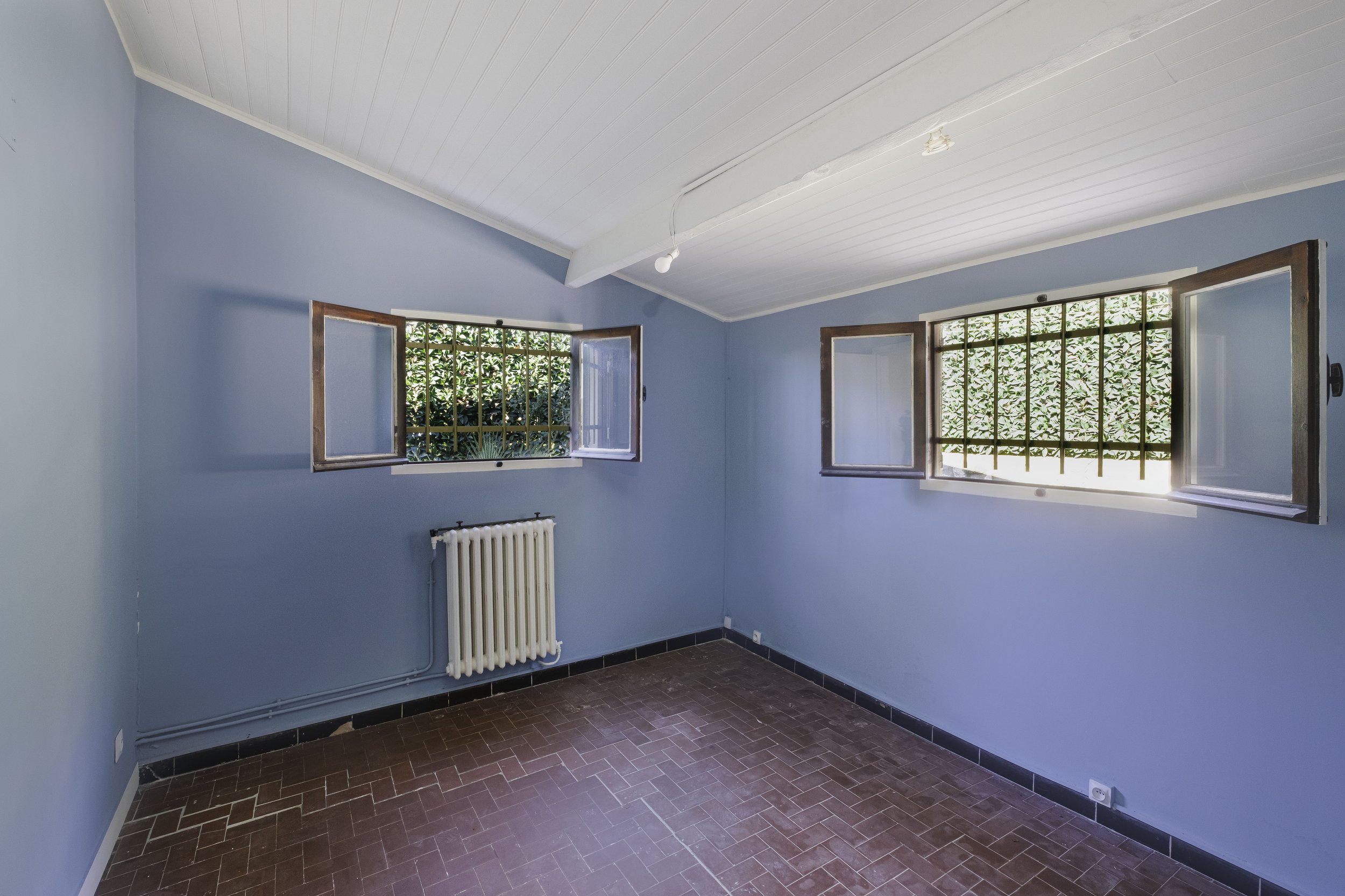 Photographie immobilière mettant en avant la luminosité et le potentiel du bien