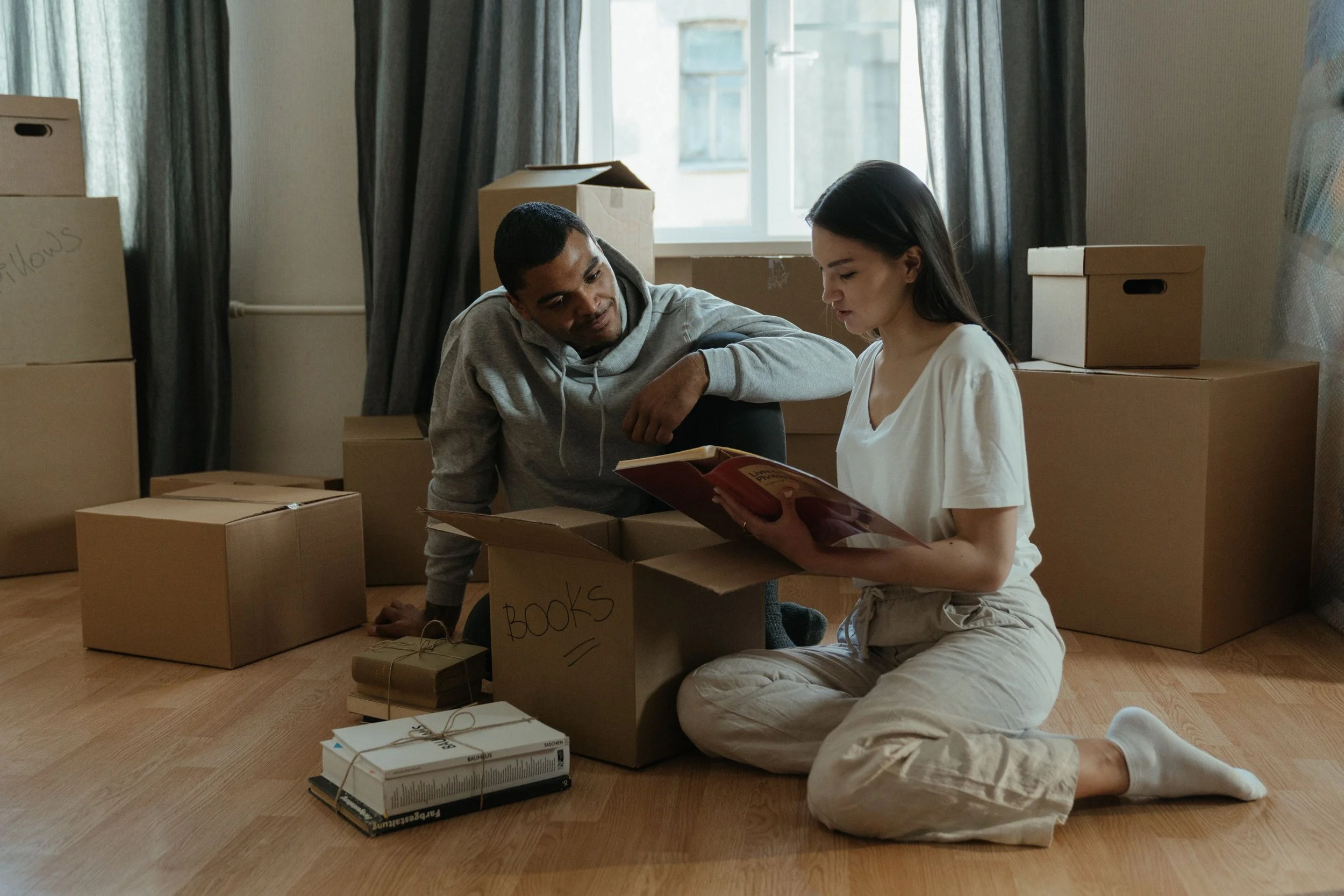 Organized home packing boxes and house keys representing a smooth job relocation in Beaverton Oregon