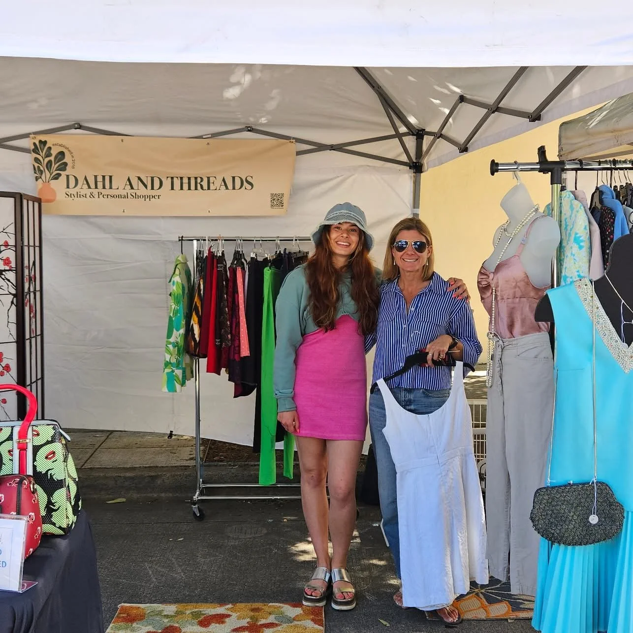 Rhonda Riley posing with a client and friend at La Strada dei Pastelli Chalk Art Festival in Portland, OR