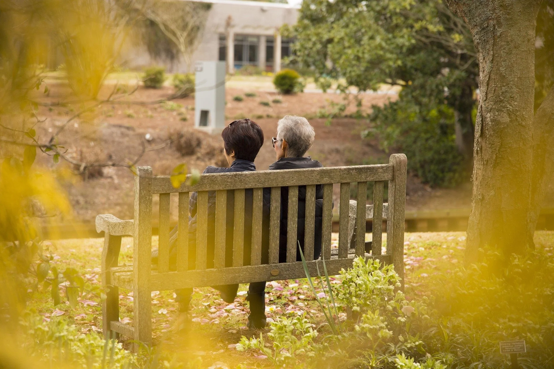 A thoughtful and serene homeowner in a sunlit room, reflecting on the emotional and lifestyle benefits of downsizing.