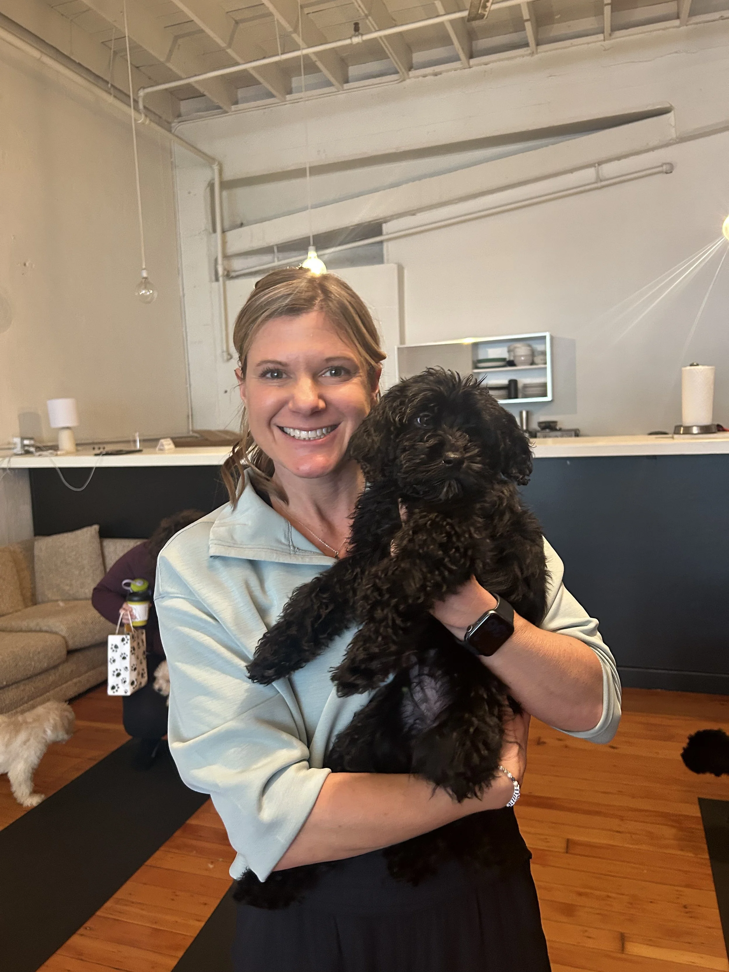 Portrait of Rhonda Riley at Puppy Yoga 2025 client appreciation event in Portland, OR