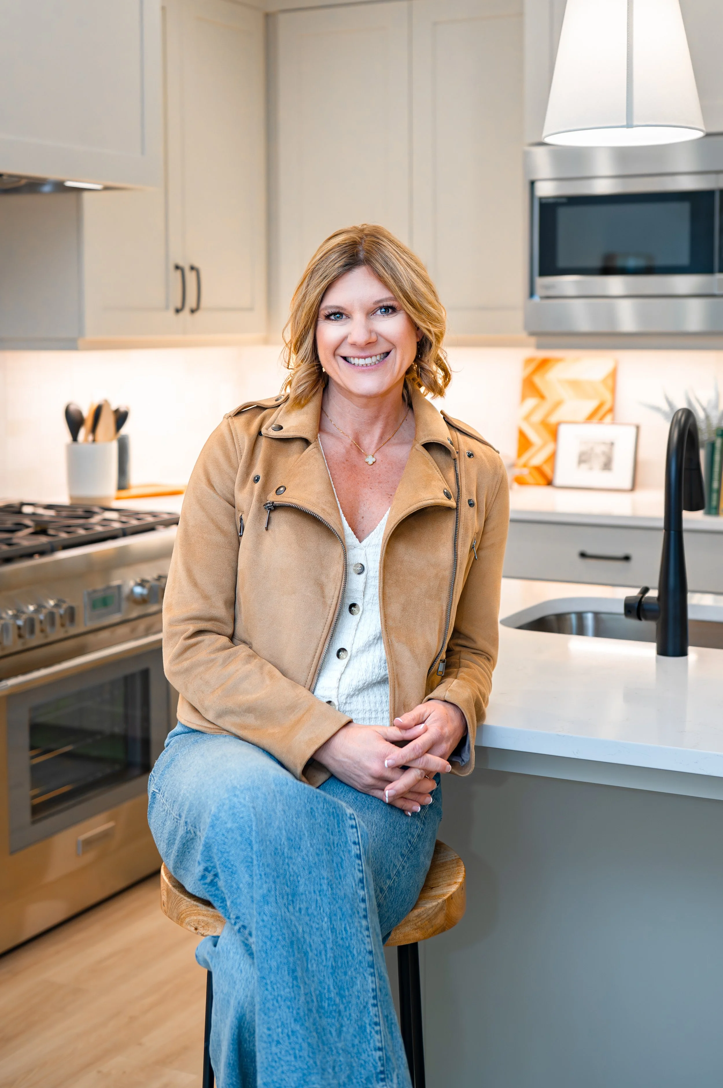 The best Real estate agent in oregon sitting at a kitchen