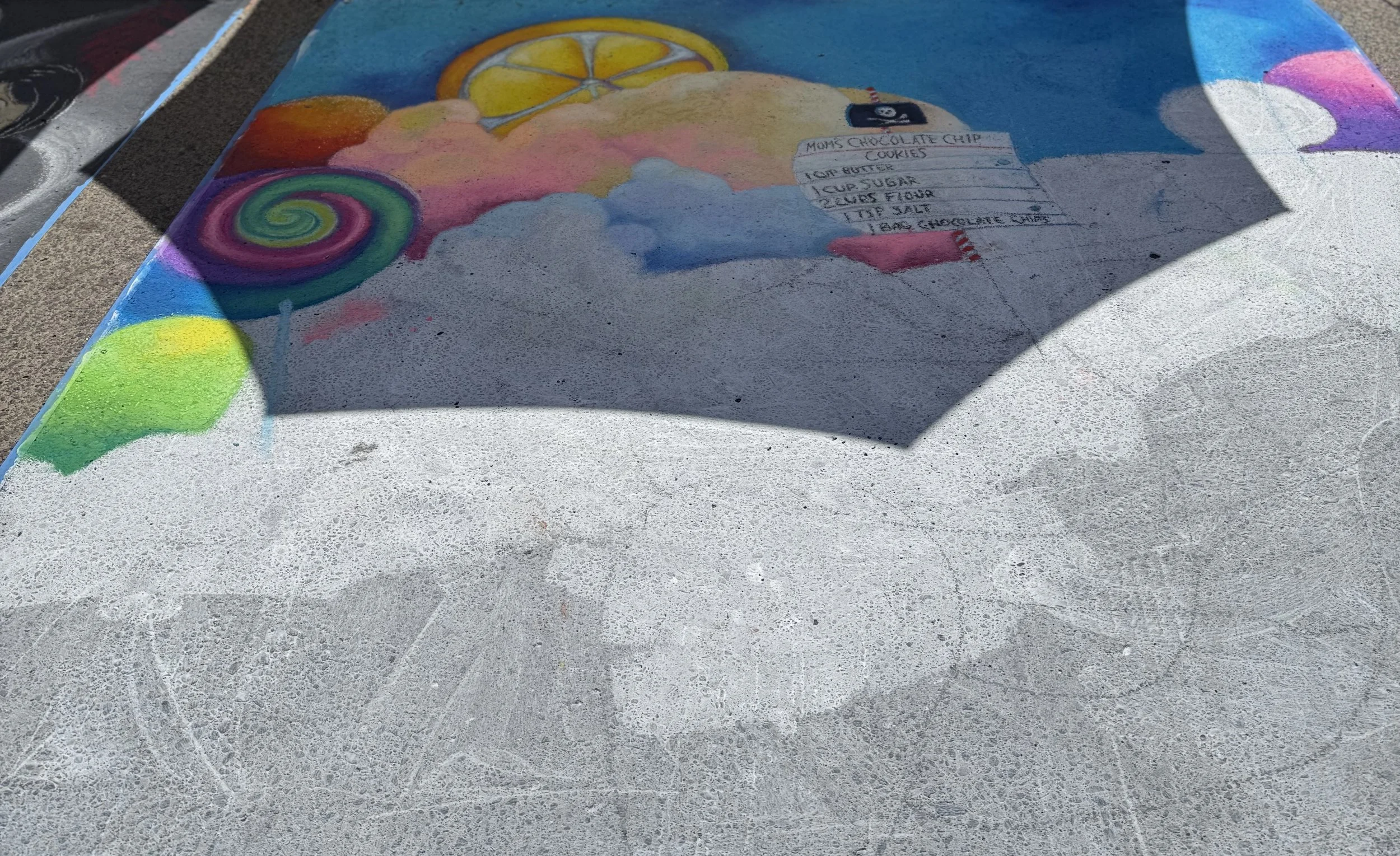 Colorful chalk art covering the streets at La Strada dei Pastelli Chalk Art Festival in Portland, OR
