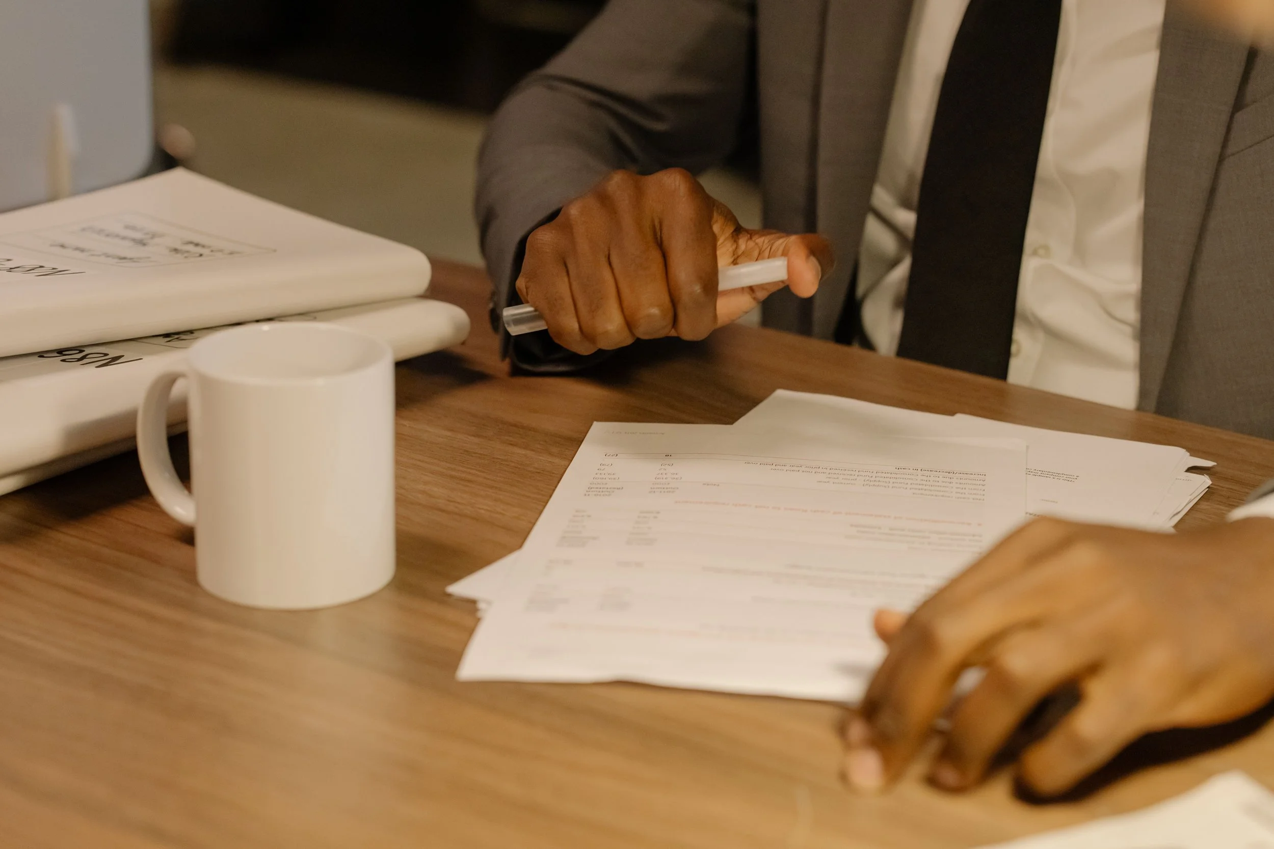 Property owner reviewing investment documents and real estate financials in Beaverton Oregon