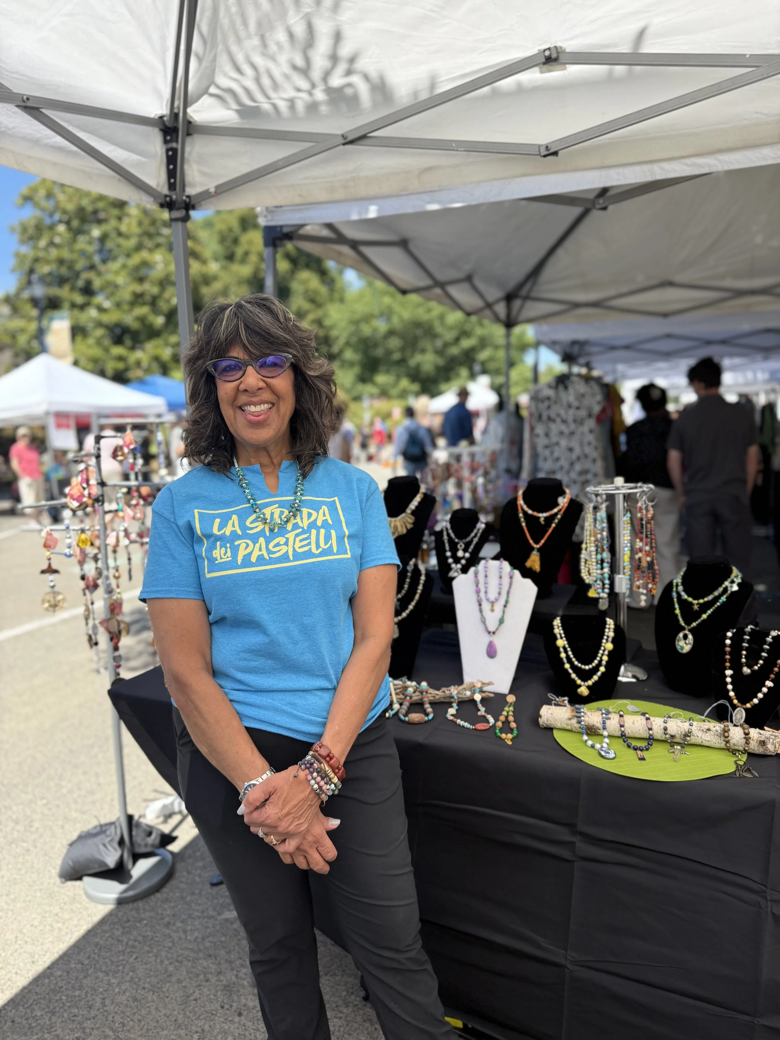 Smiling client enjoying La Strada dei Pastelli Chalk Art Festival in Portland, OR