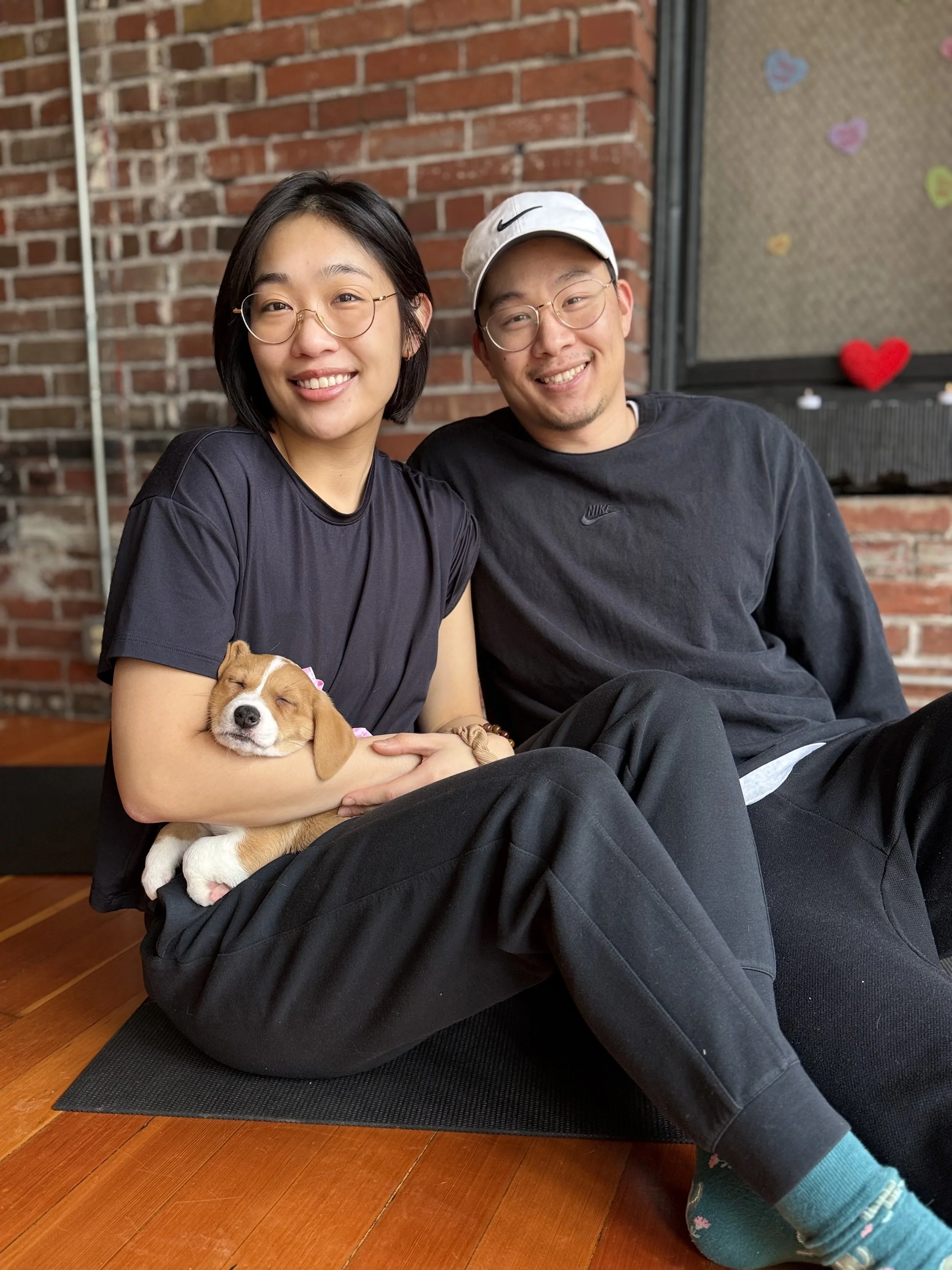 VIP clients interacting with puppies during Puppy Yoga 2026 in Portland, OR