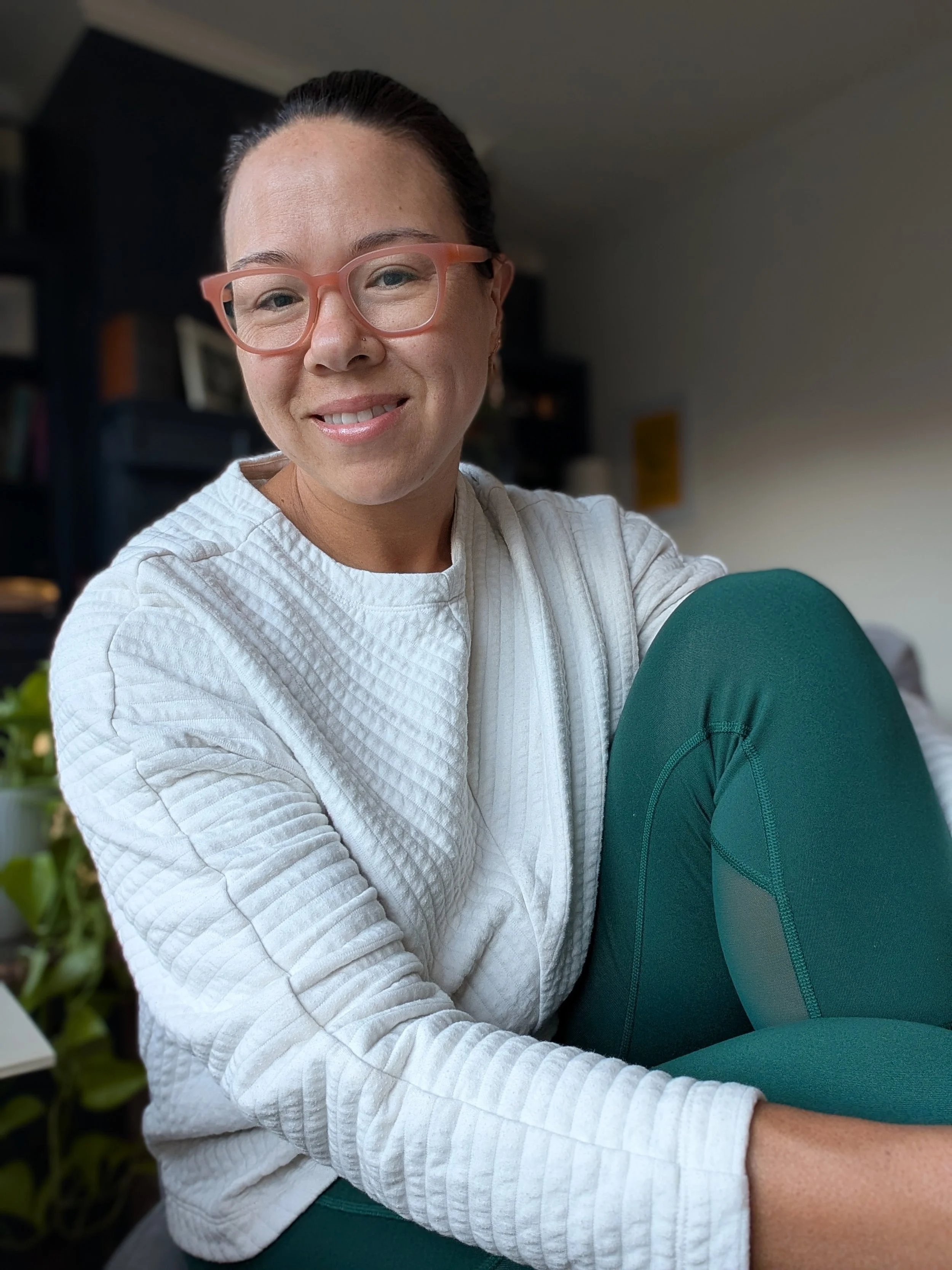 Mali, a Certified Health and Wellness Coach in Austin, TX, specializing in tiny experiments and habit science for moms.