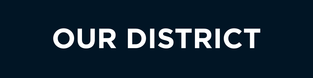 Text saying 'Our District' on a dark background.