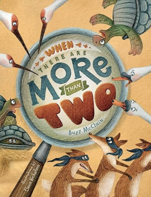 The book cover showing animals and a magnifying glass