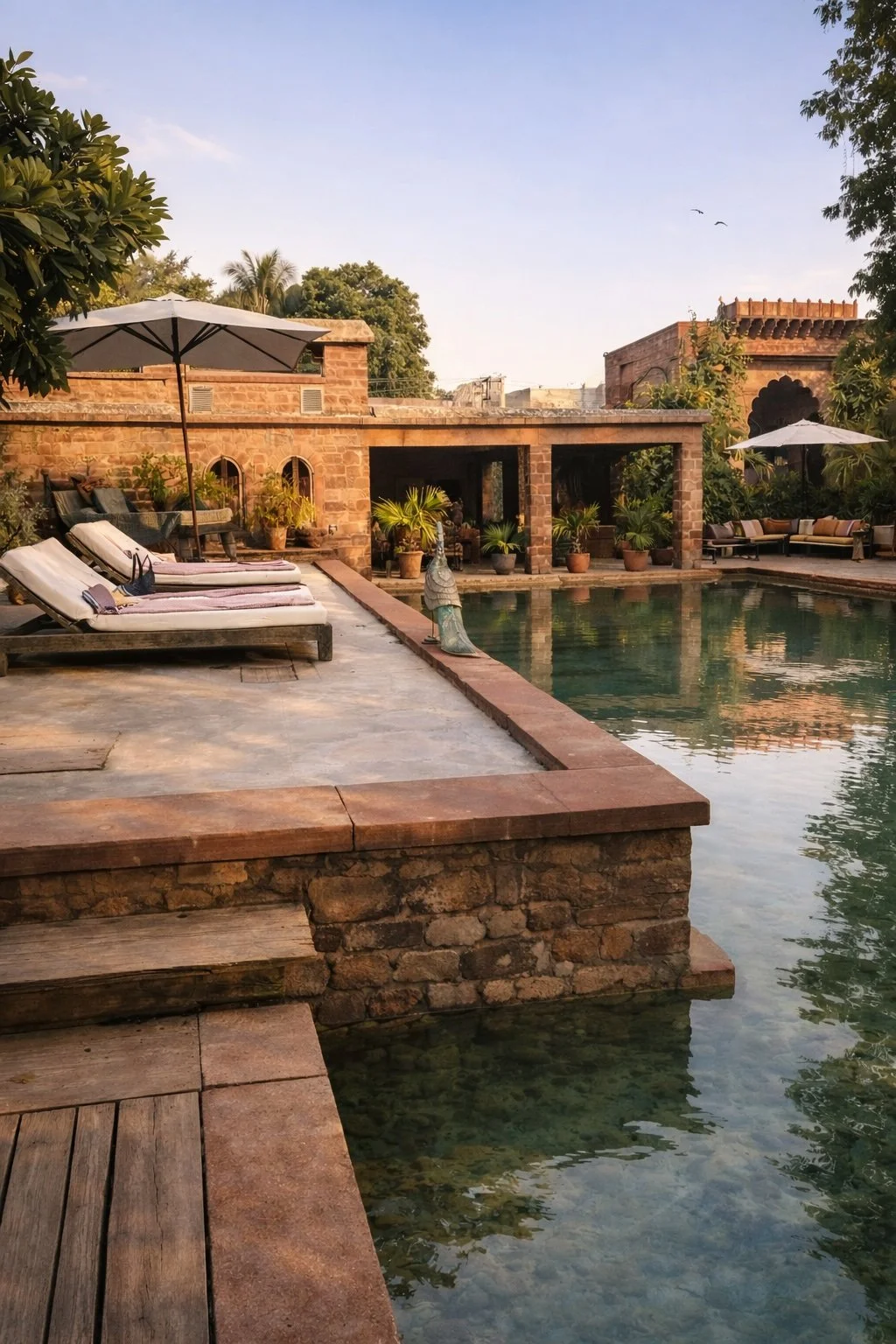 Pool and gardens at Sukh Sagar heritage haveli, Jodhpur, Rajasthan - India with Bernadette