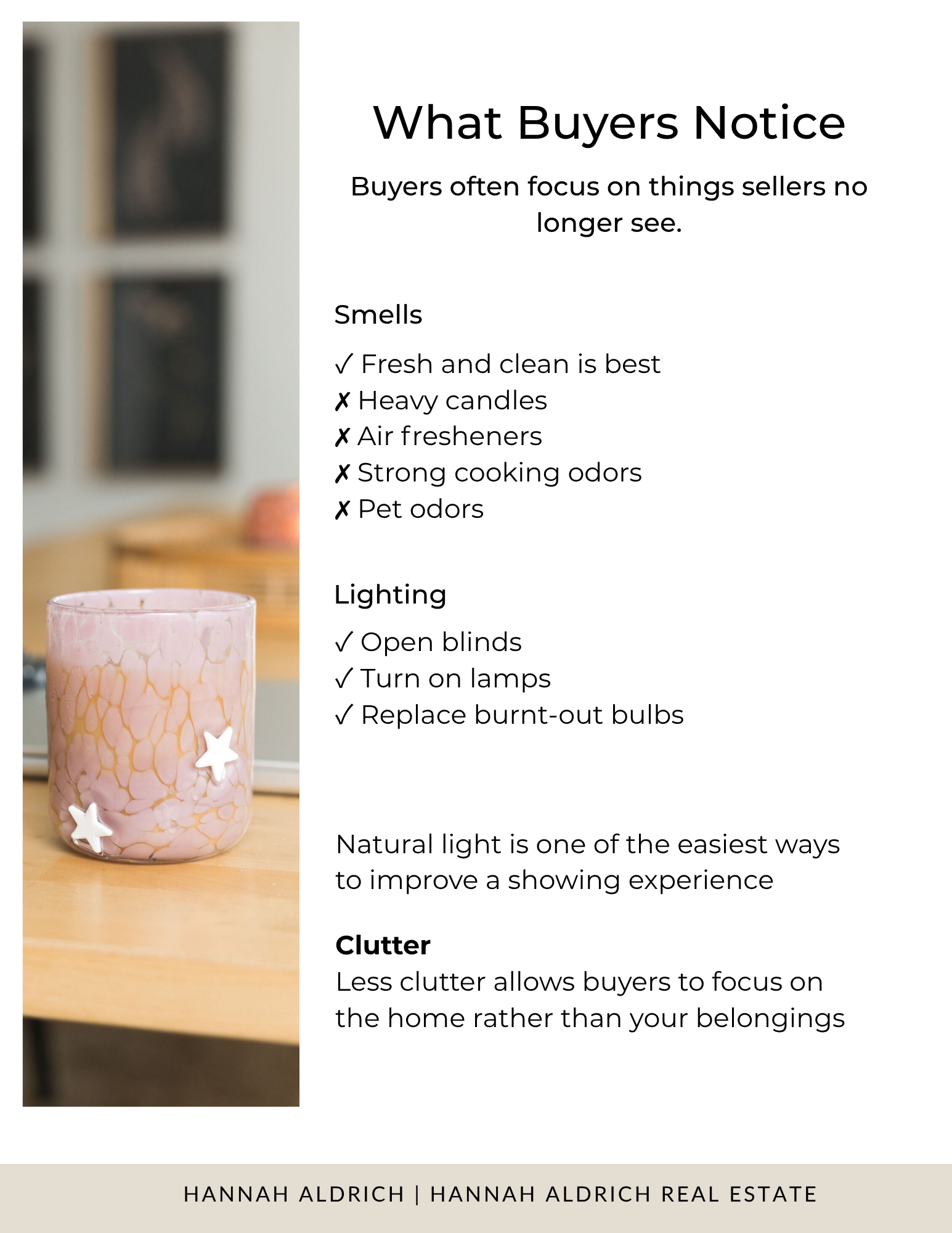 Decorative pink glass candle holder with white star-shaped accents, placed on a wooden surface in a cozy interior setting.