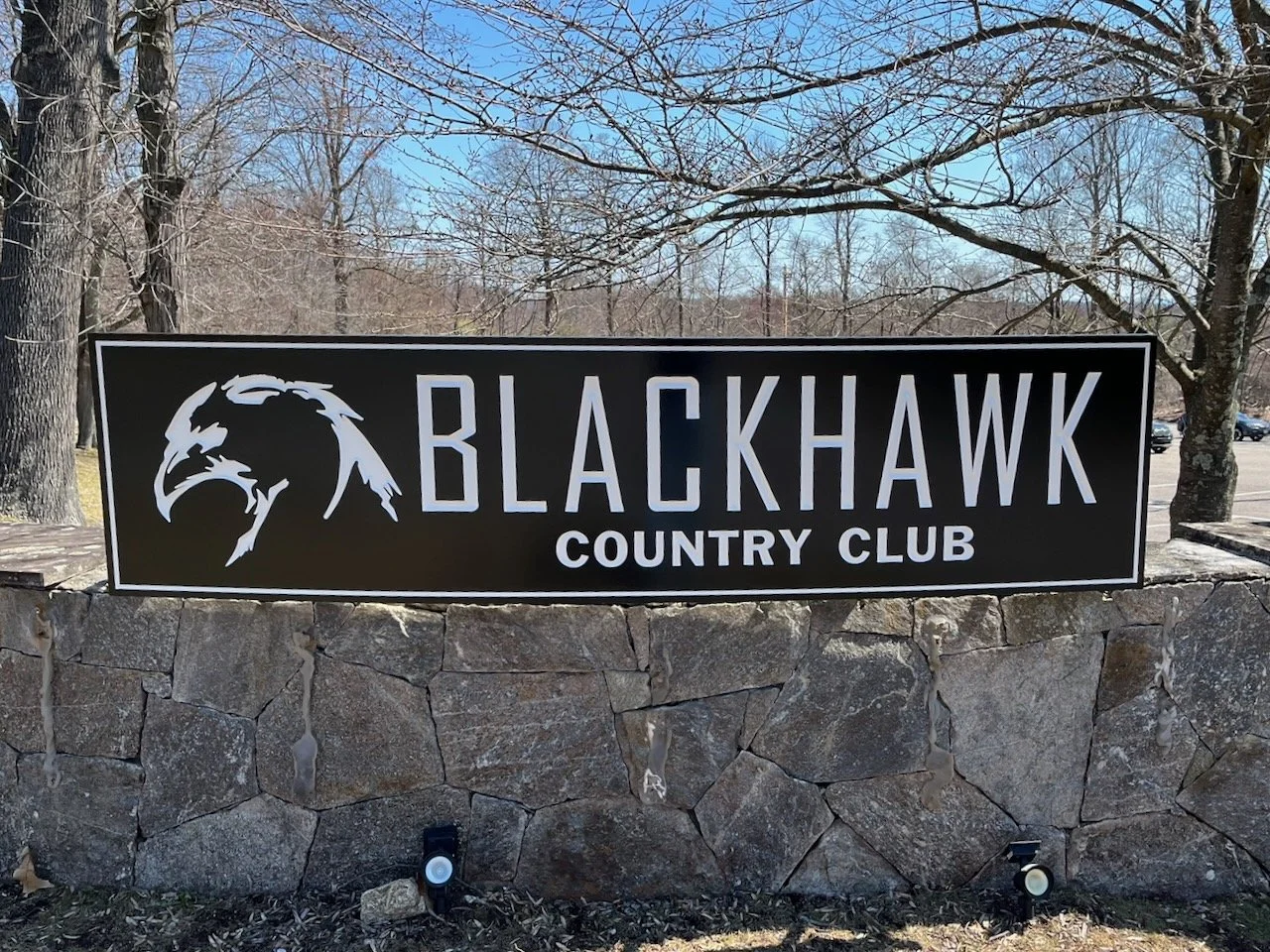 Carved-Wood-Sign-Stone-Wall-BW - 1.jpeg