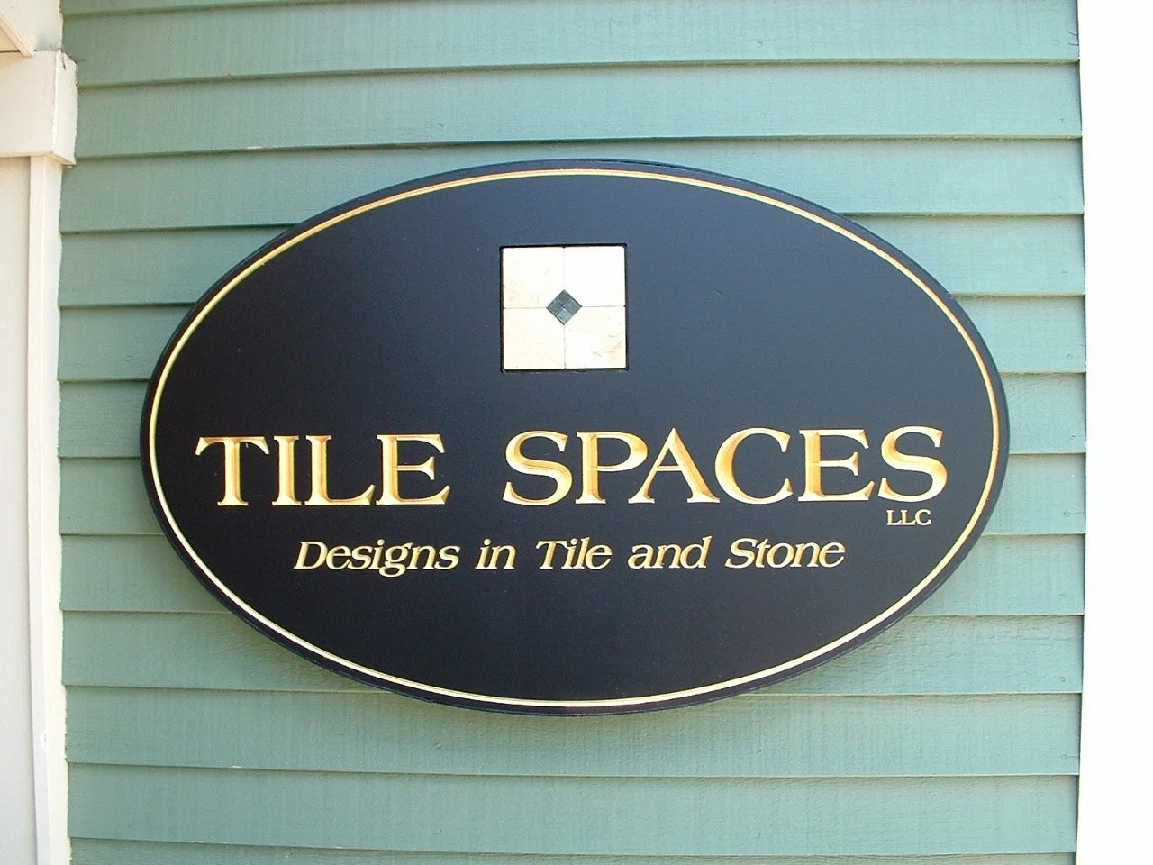 Round-Carved-Wood-Sign - 1.jpeg