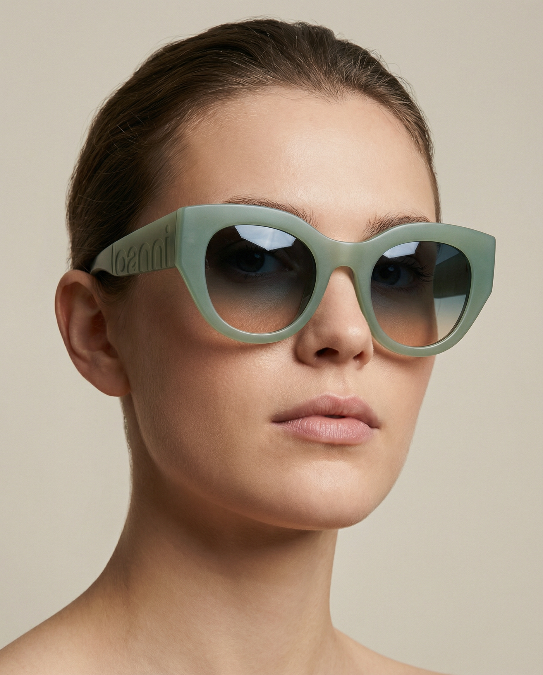 Add 110203 to Bust-up studio portrait on a clean neutral background. Soft diffused lighting with gentle shadows. Model centered in frame_ facing camera or slight 3 4 turn. Minimal styling_ no distractions. Sharp detail on the sunglasses acc.png