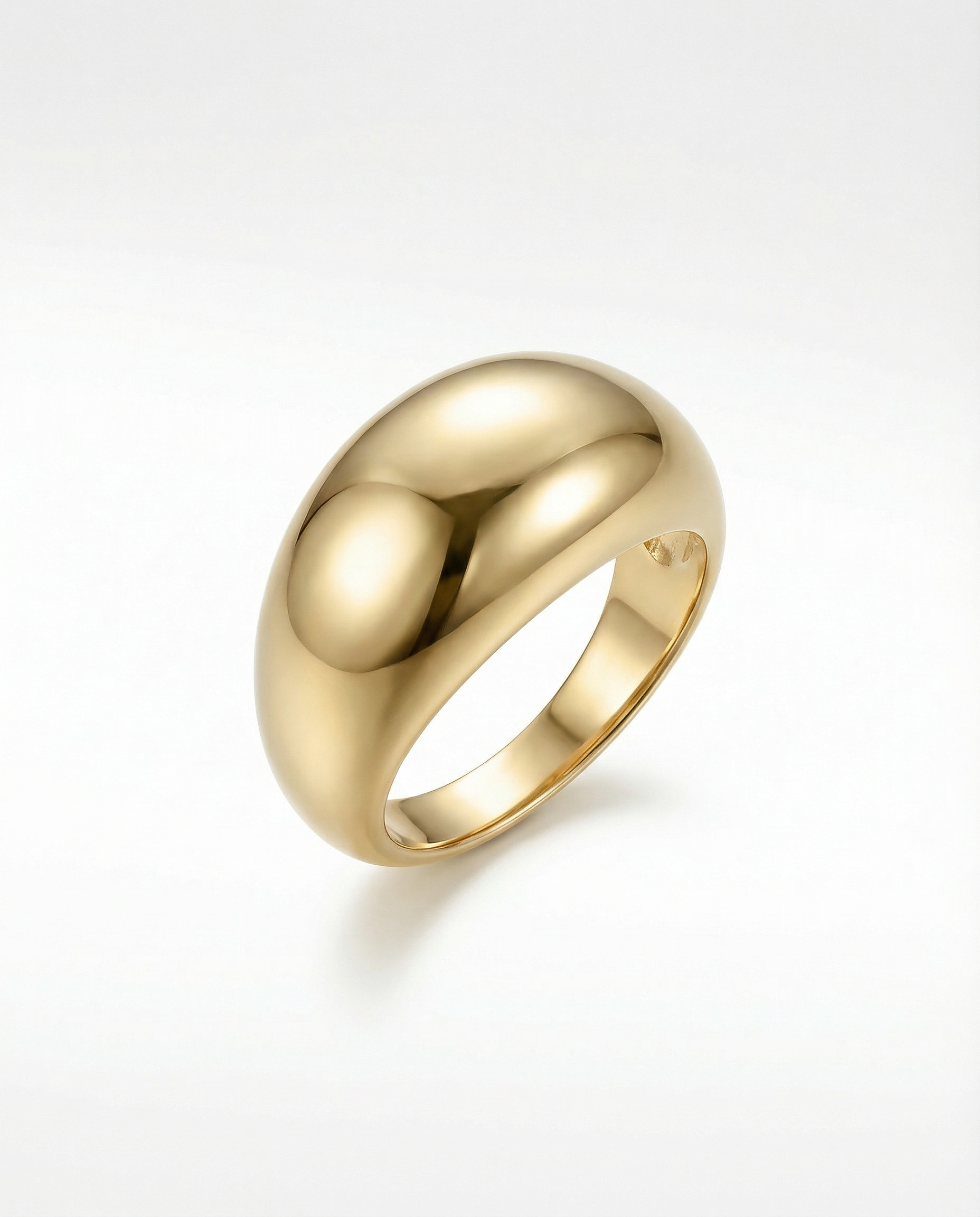 idk agency Gold ring with a smooth, rounded design on a white background.