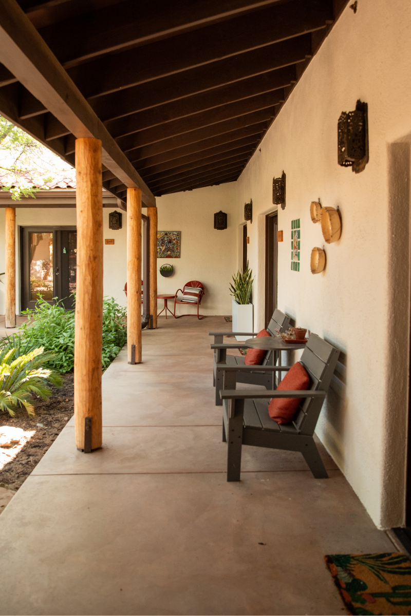 Seating in the tranquil shared courtyard of The Lodge