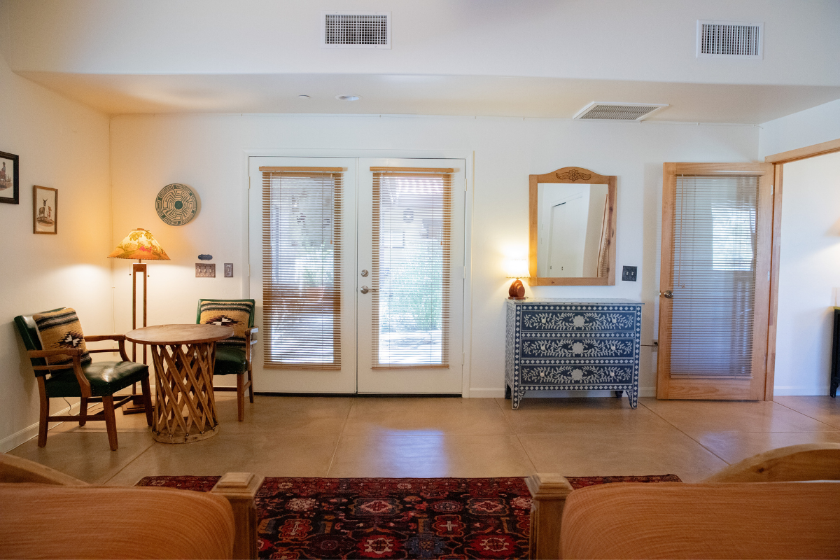 Seating area and French Doors in the Sierra Madre Suite