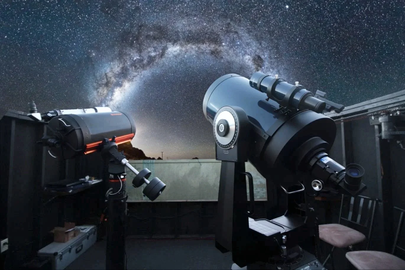 Telescopes at Spencer's Observatory pointing towards the starry night skies