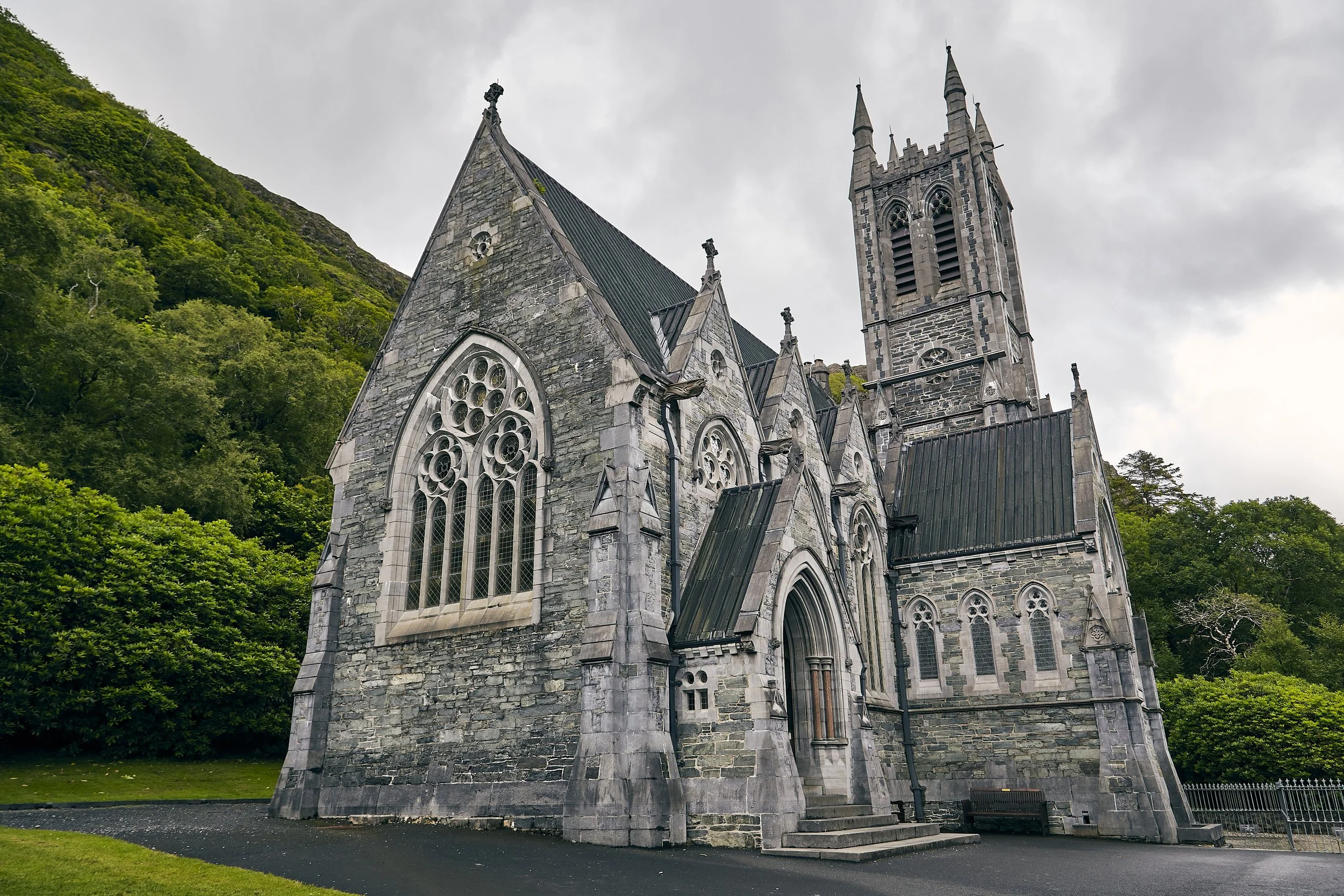 low-angle-shot-kylemore-abbey-ireland-surrounded-by-greenery.jpg