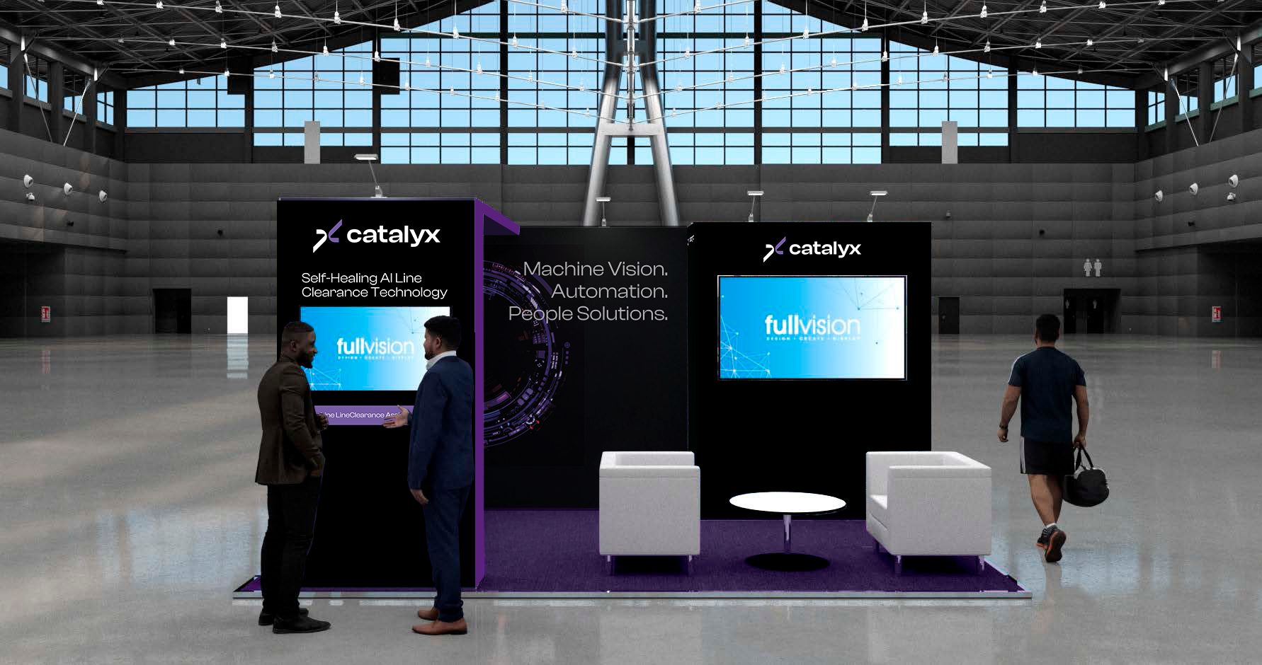 Exhibition booth for Catalyst at a convention center with two digital screens displaying the company’s branding and services. Two people are talking at the booth, while another person walks away carrying a bag.