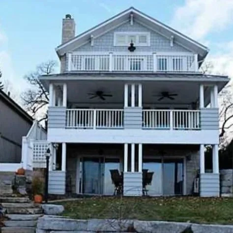 After - Michael & Angela created a masterpiece, inspired by Seaside, an old Florida architectural charm--mitered corners, wraparound porches, timeless warmth that pulls you right in. 