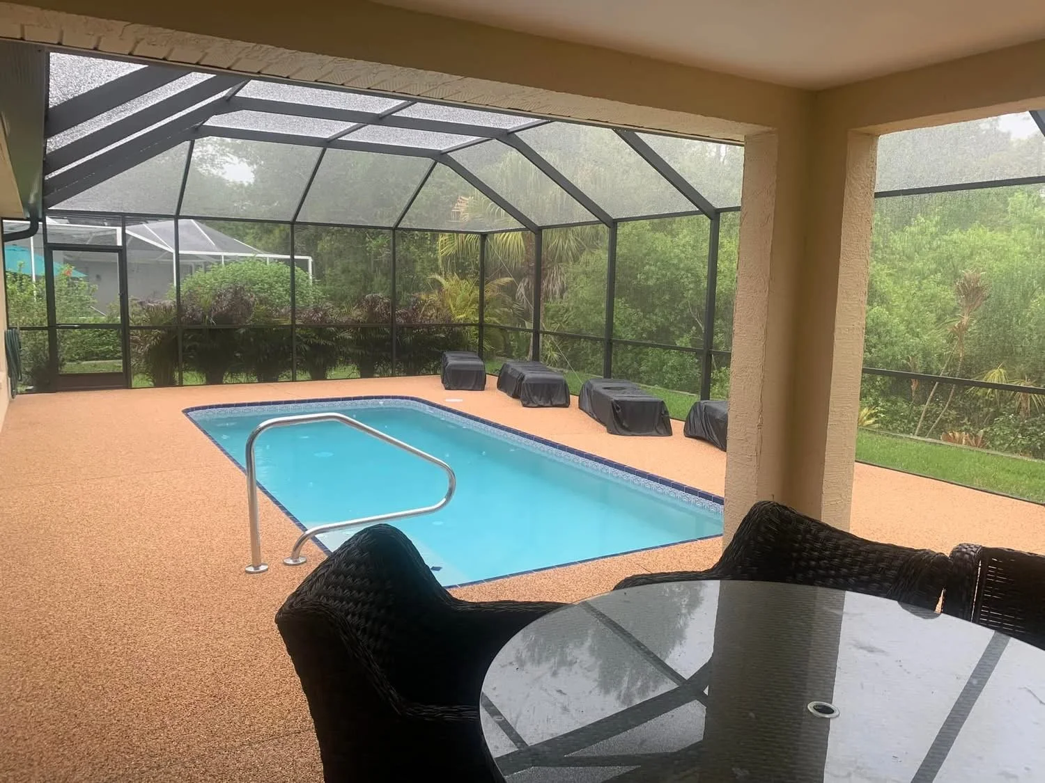 After: MichaelAngela Properties gave it life - wide eight-foot stretch, lush pebble stone finish that's pretty, smooth, and drains like a dream. Sit, sun, splash.