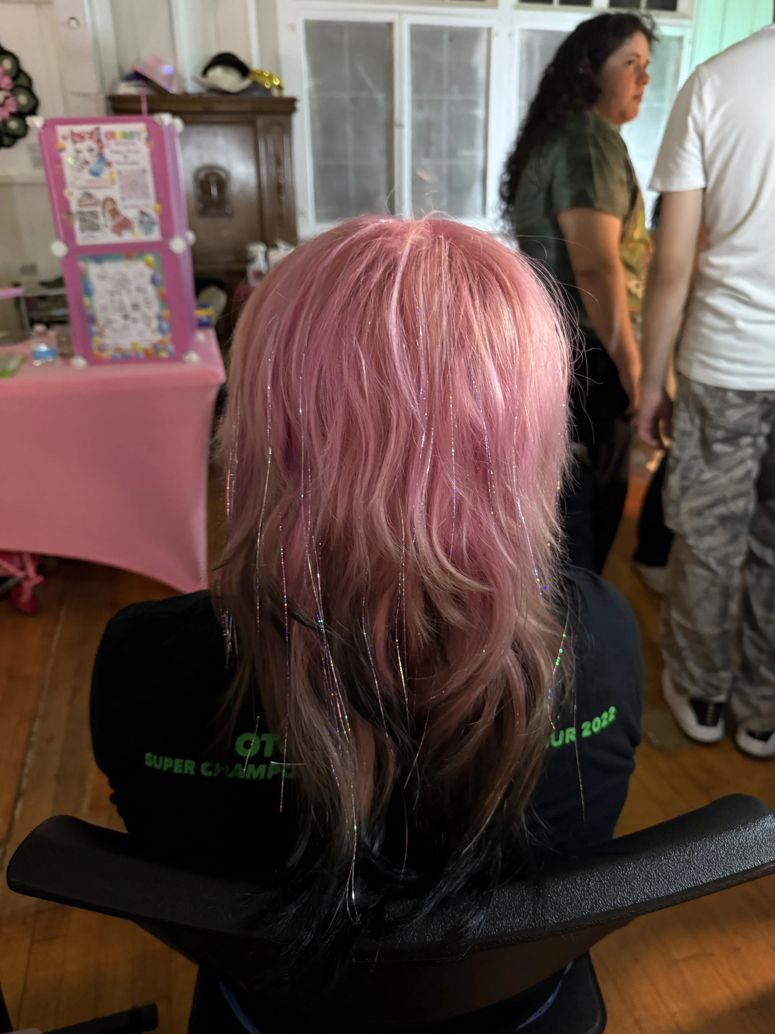 Pink hair tinsel installed at event