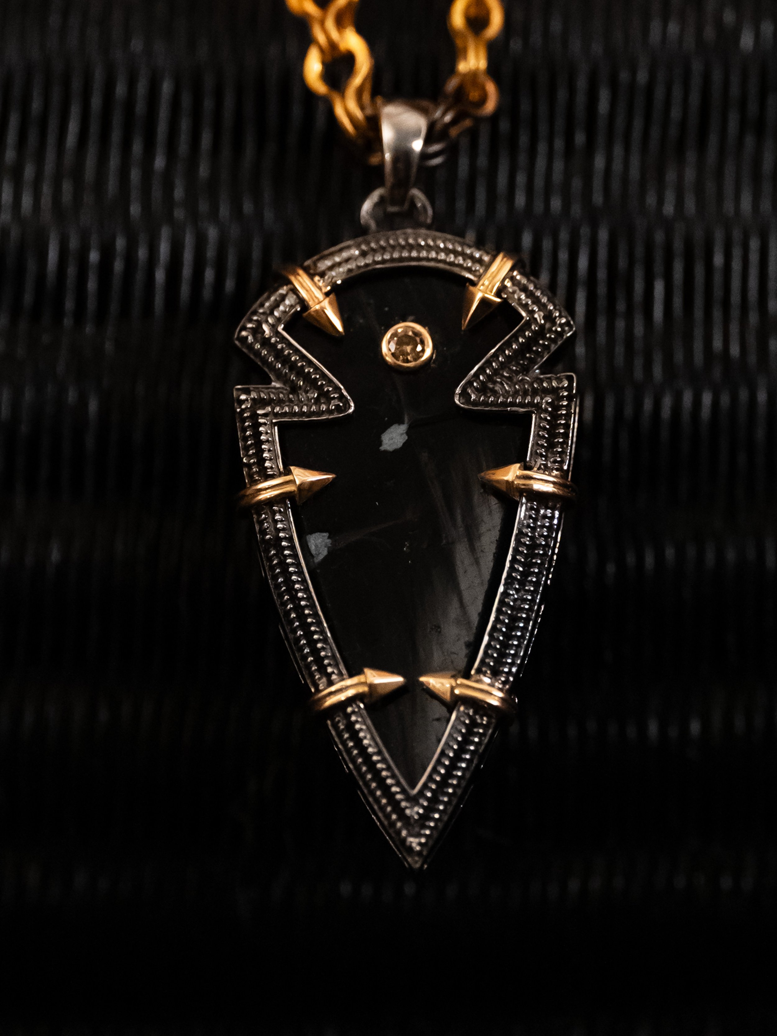 Simple Arrowhead-Champagne and Obsidian.jpg