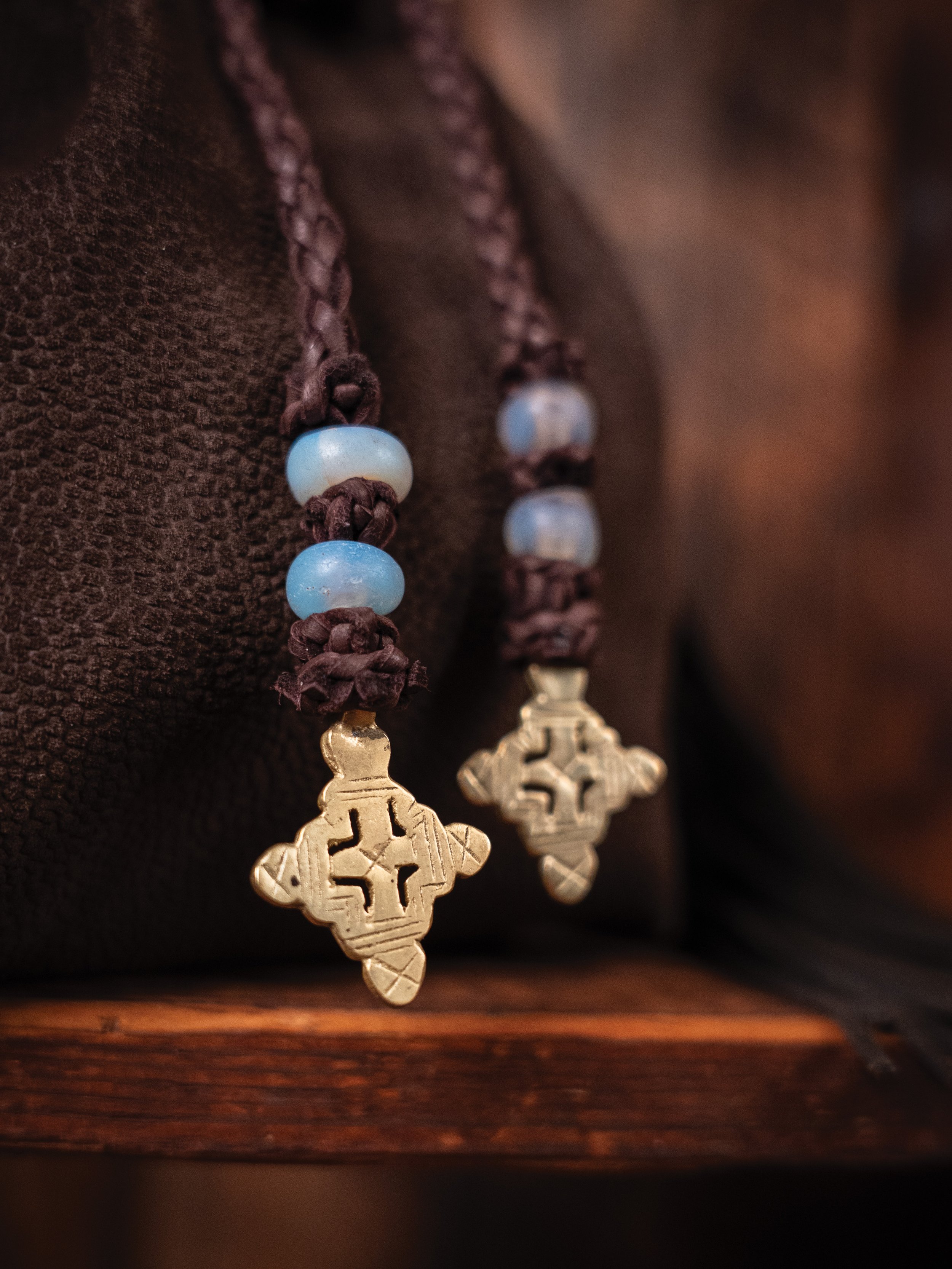 Charm Nommo SML Brass Cross.jpg