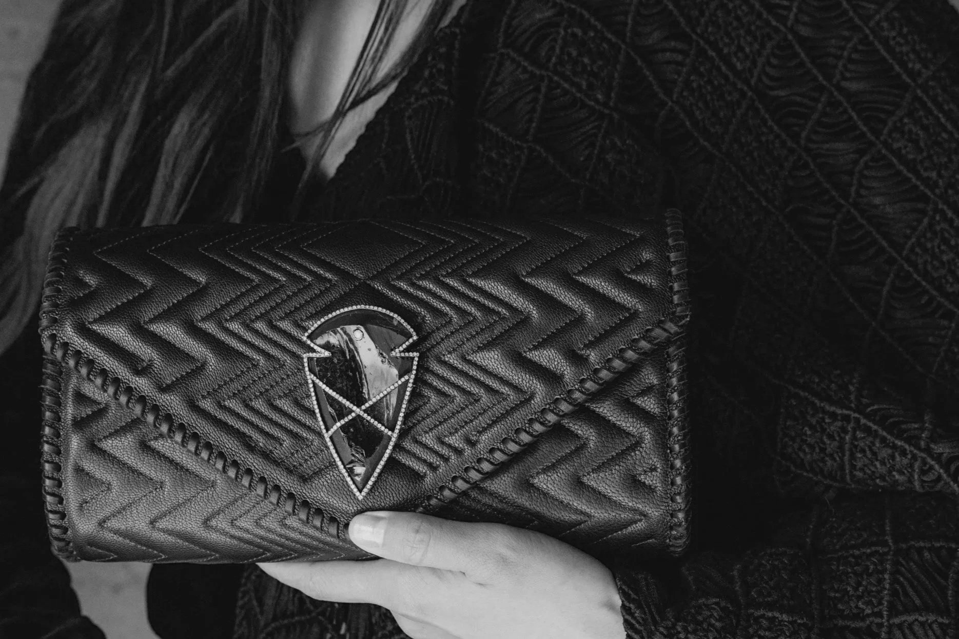 Details of trapunto work Laura has created. Each line has been stitched onto deer leather to create this beautifully intricate zig-zag pattern.