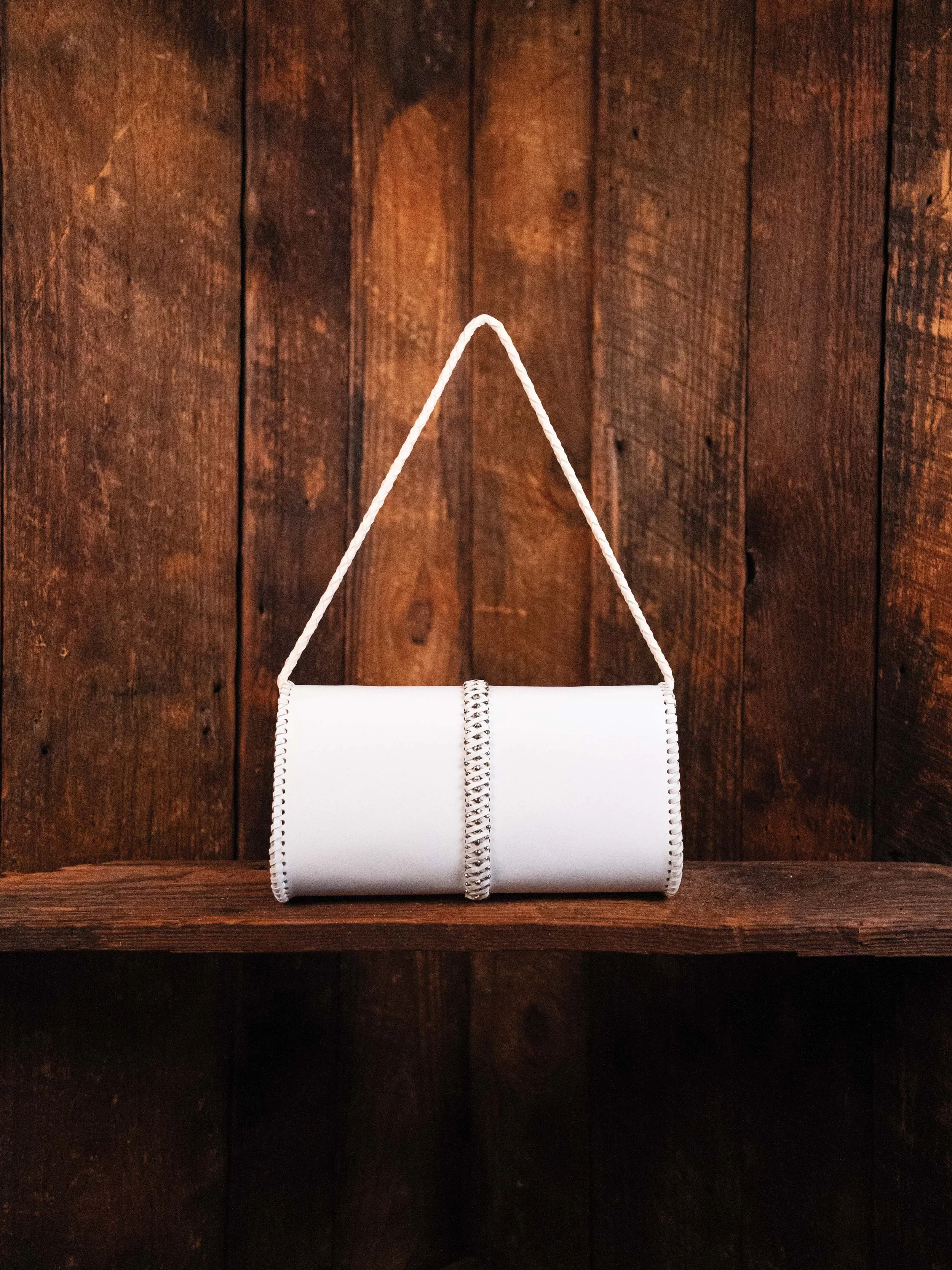 White Bovine Clutch Back Handle UP.jpg
