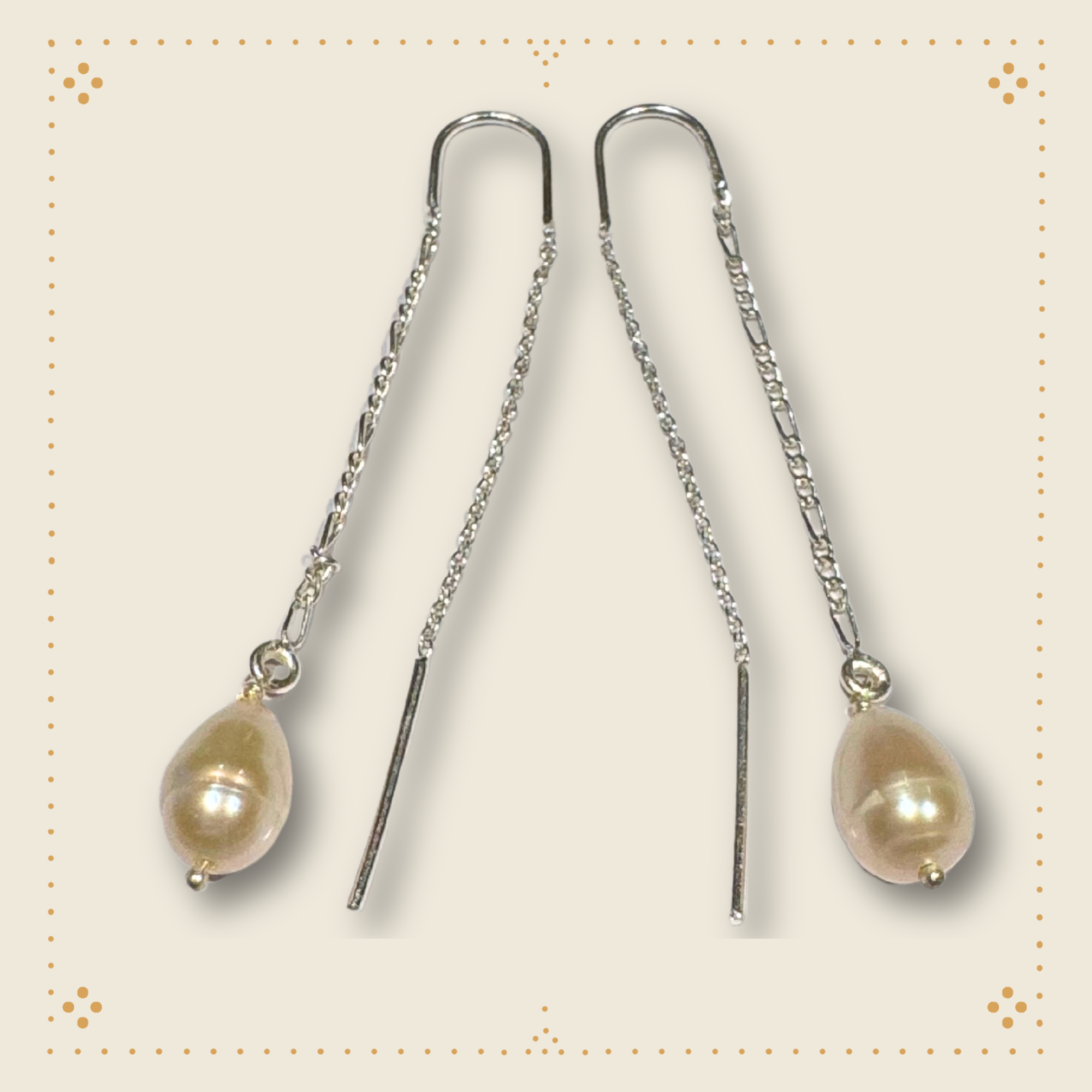 Saly Dudmesh Pearl needledrop earrings.png