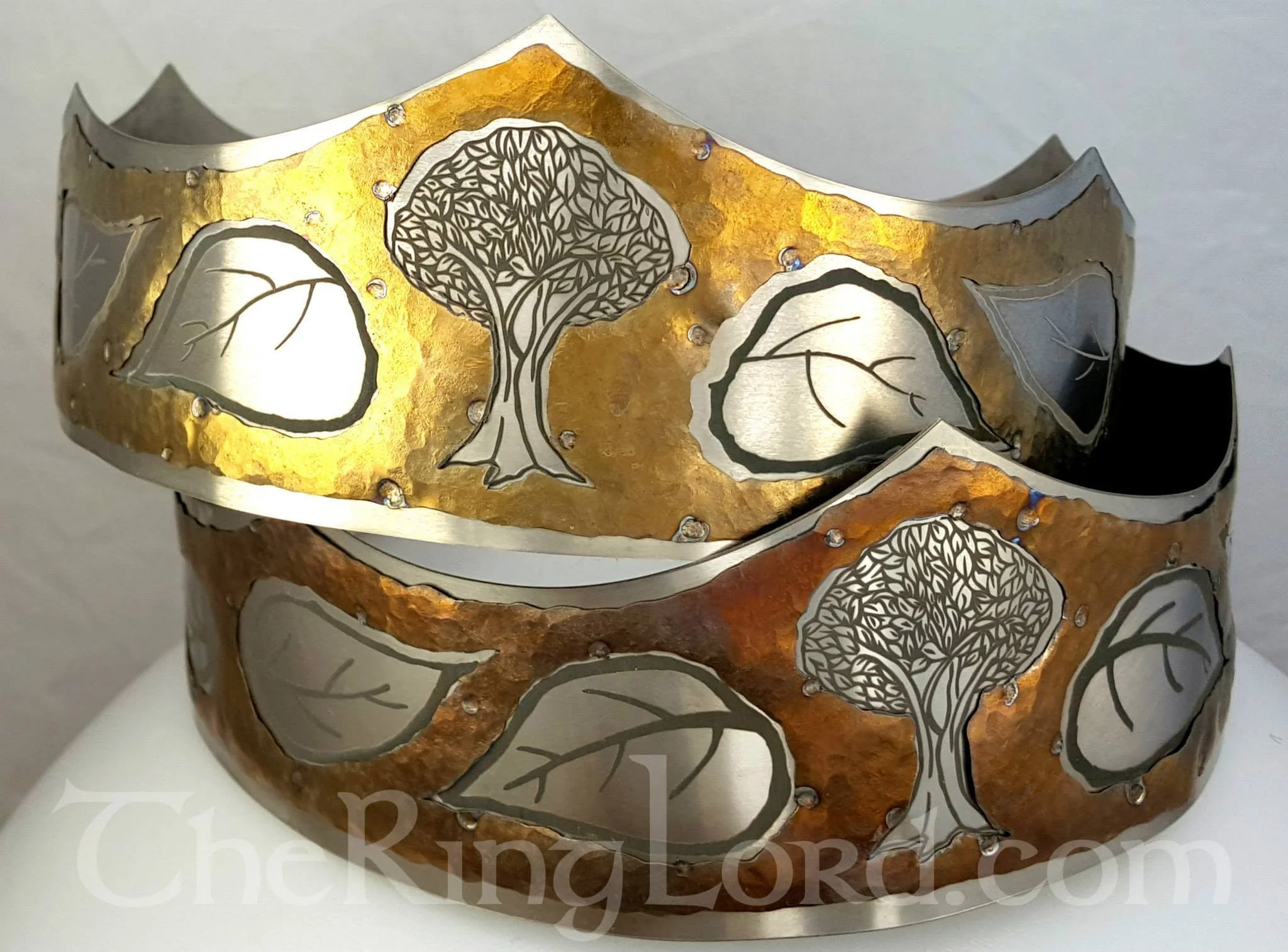 Coronets for the SCA Barony of Myrgan Wood - anodized titanium, laser cut and etched