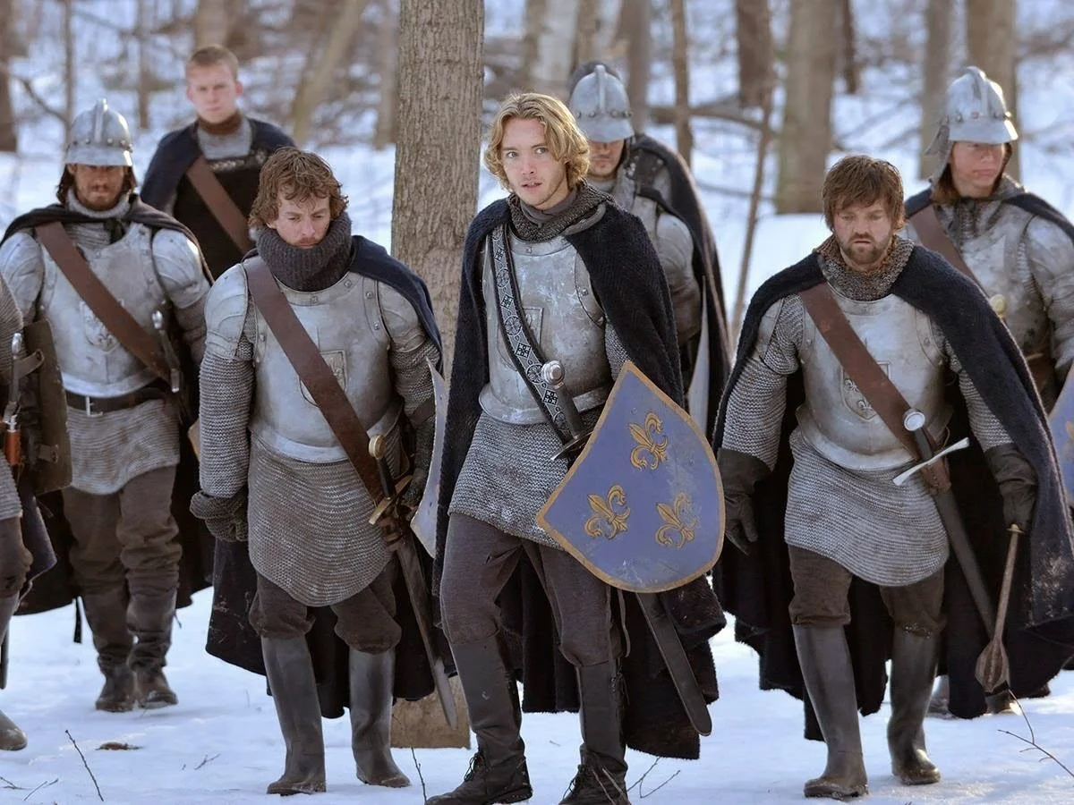 Reign (2013-2017)
We made 8 shirts using 1/2 rubber rings and half titanium colored anodized aluminum. Honestly it looks like they re-made the design with knit wool for the production shots I could find online.